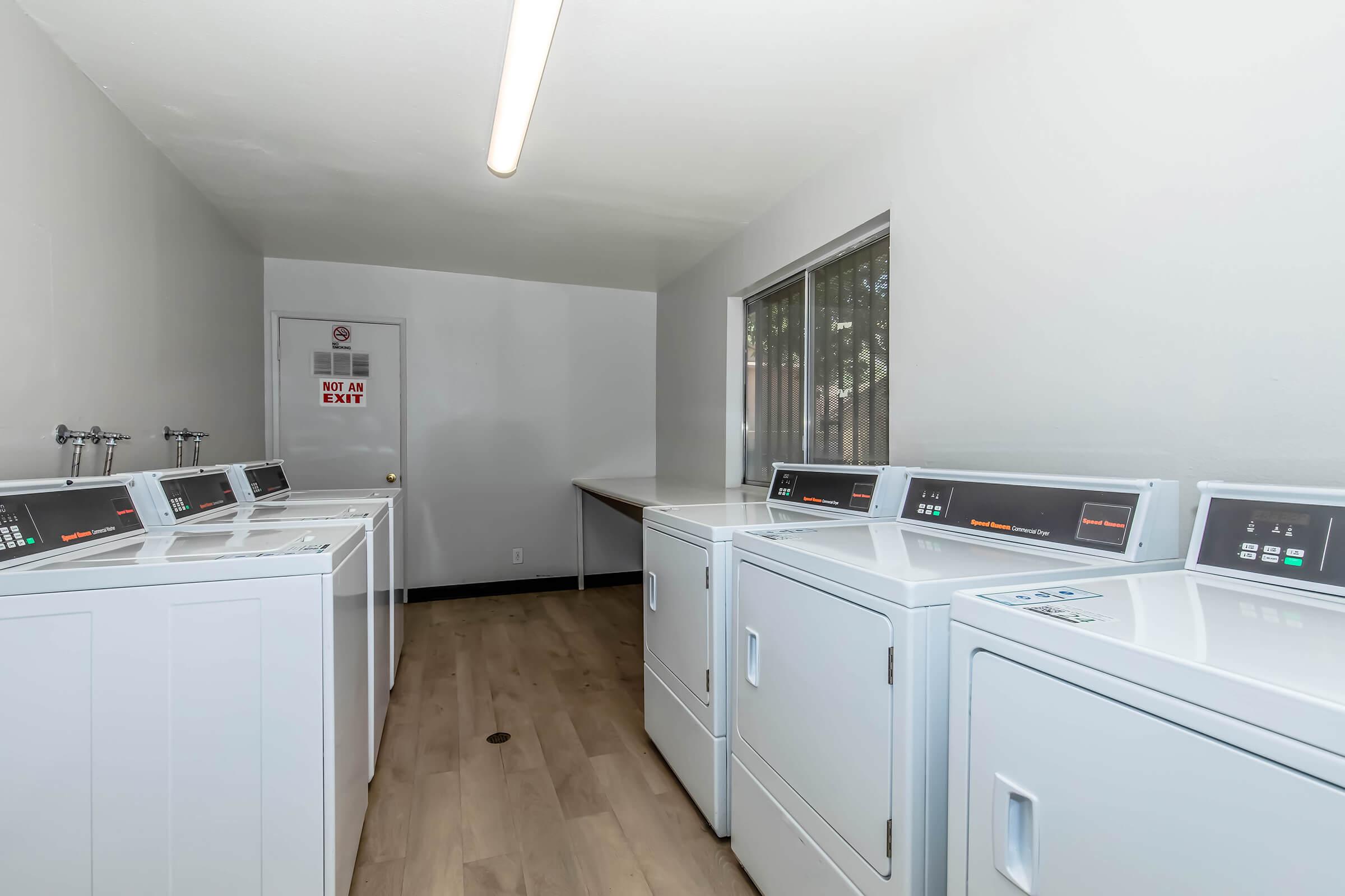 a kitchen with a stove and a refrigerator