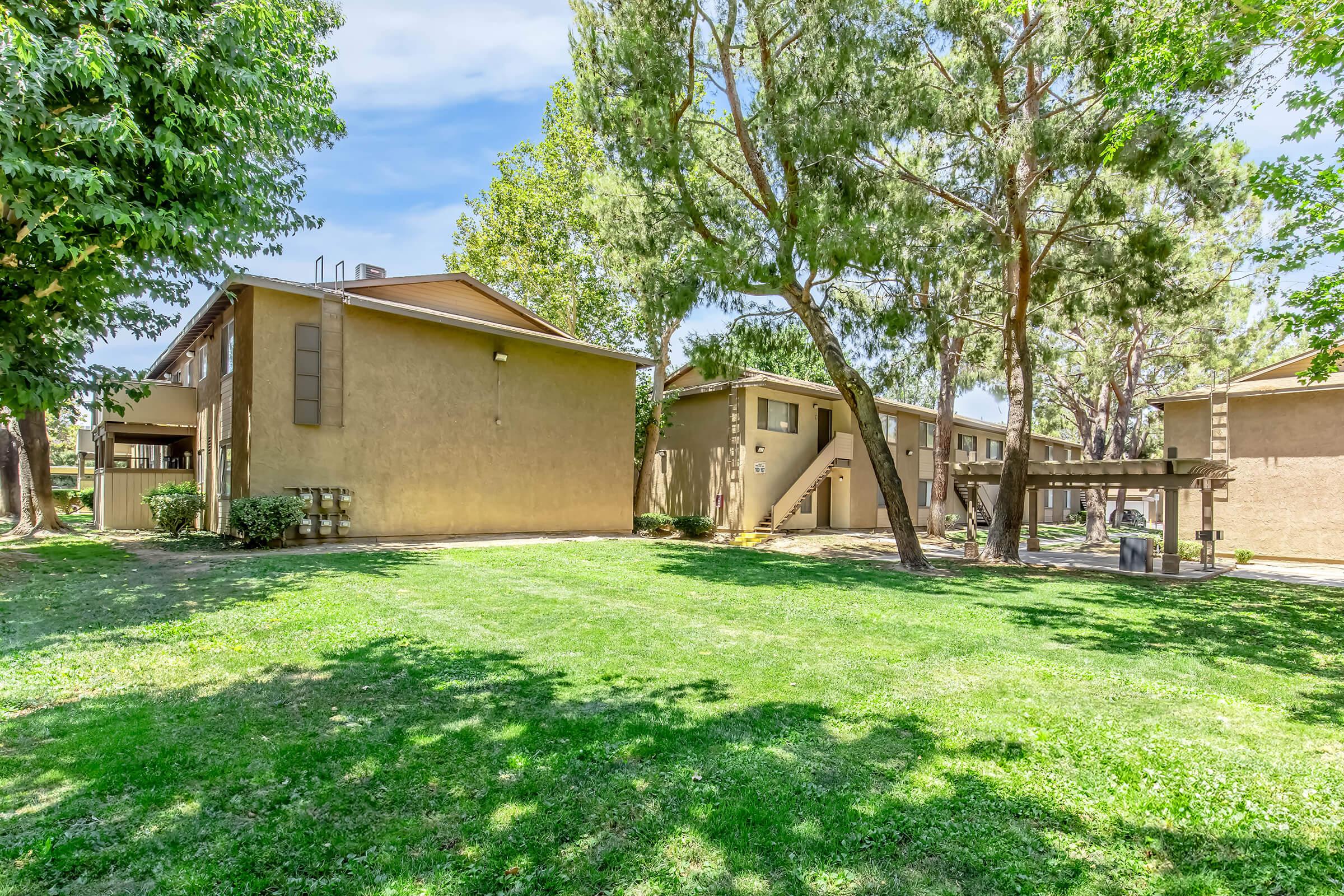 a large lawn in front of a house