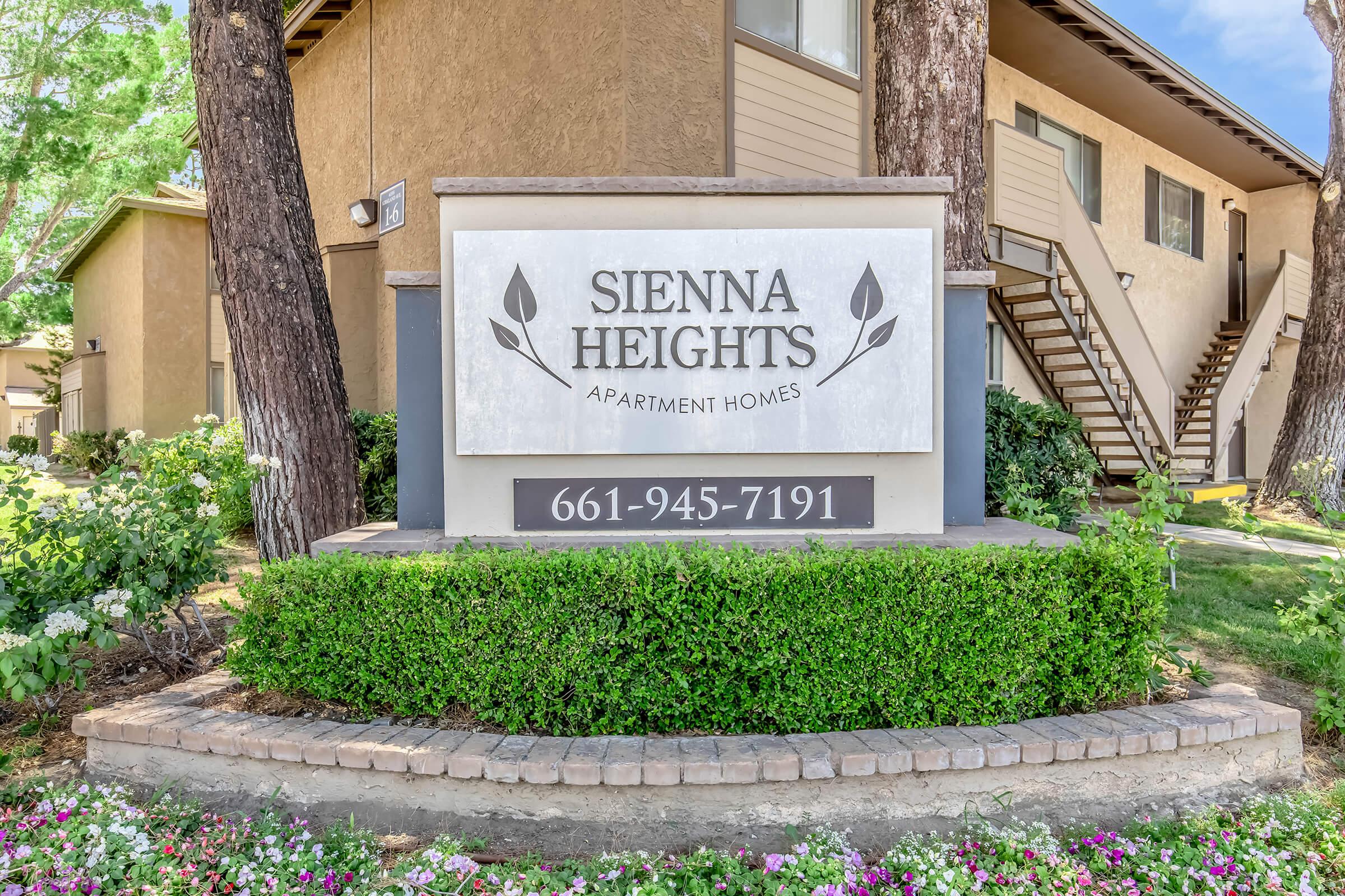 a house that has a sign on the side of a building