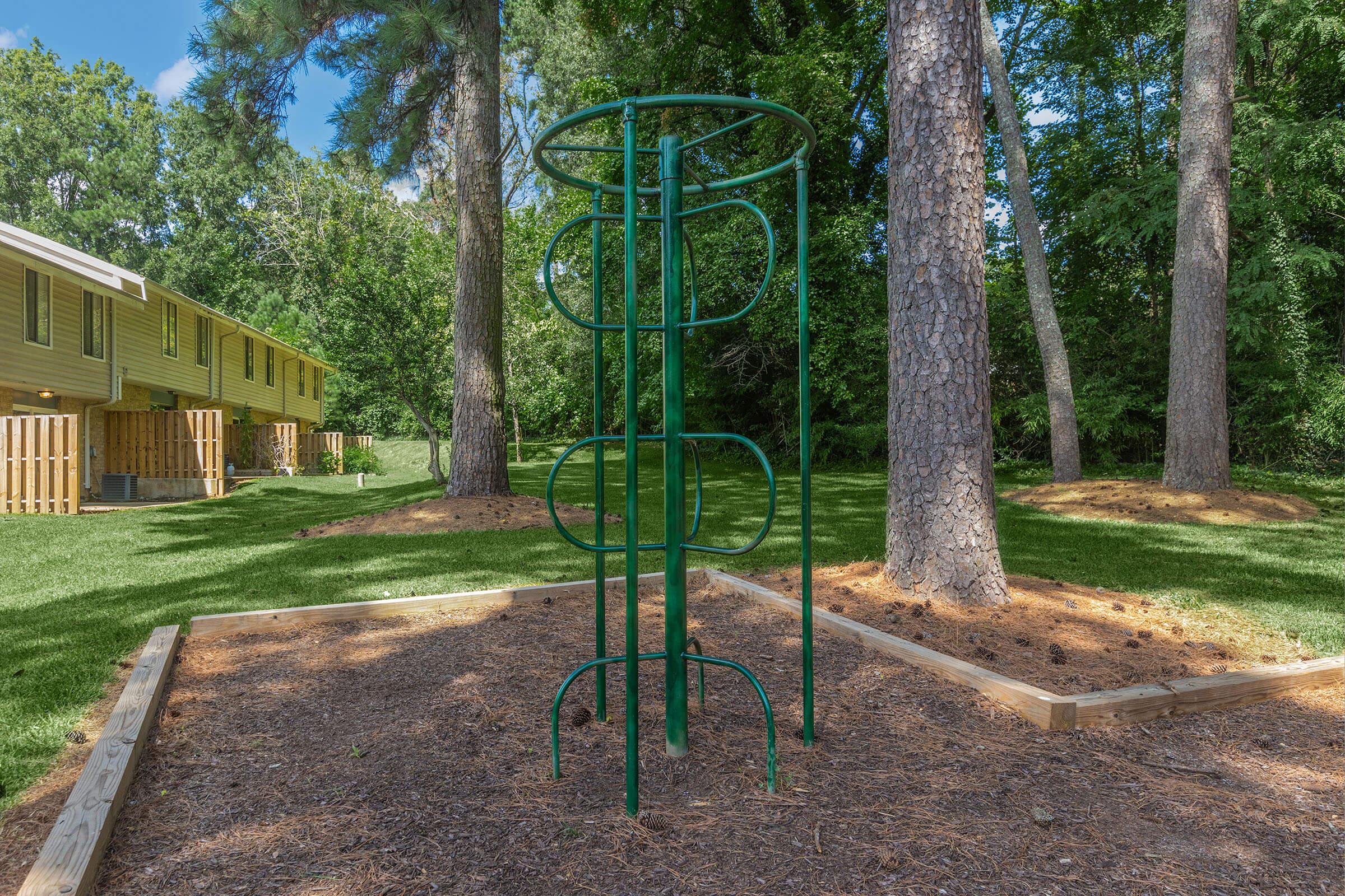 a yard with grass and trees