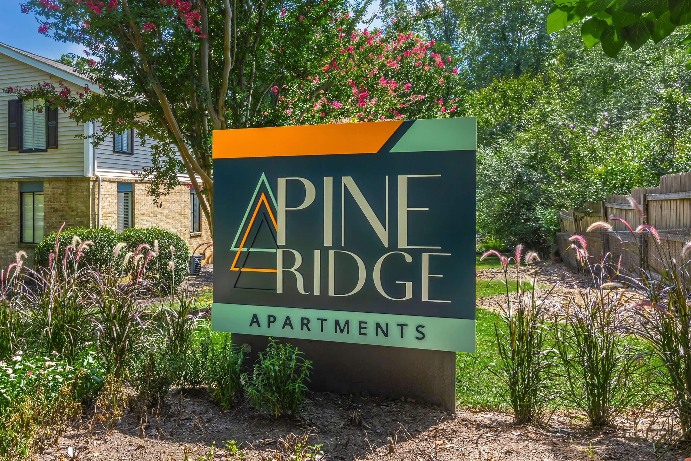 a sign in front of a house