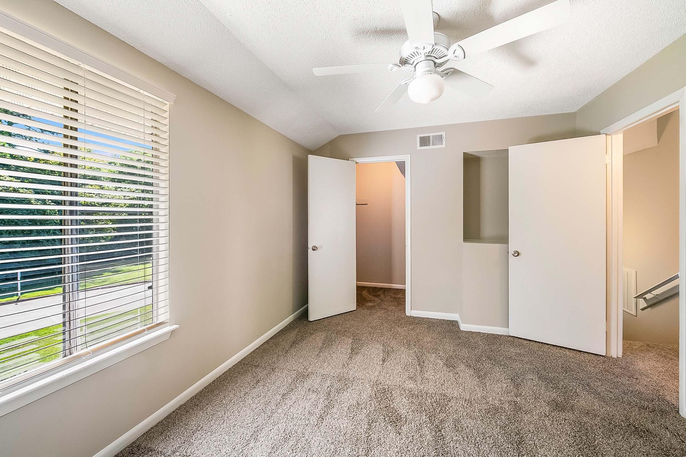 a room with a sink and a window