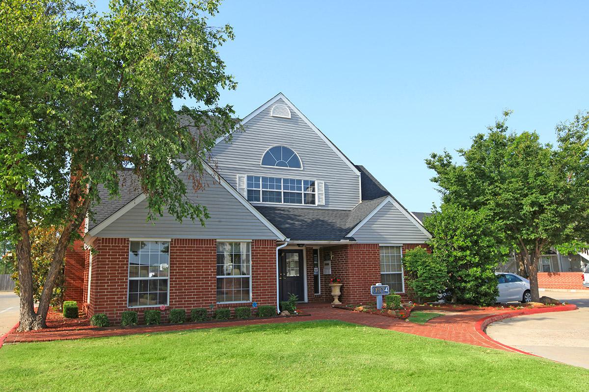 a large lawn in front of a house