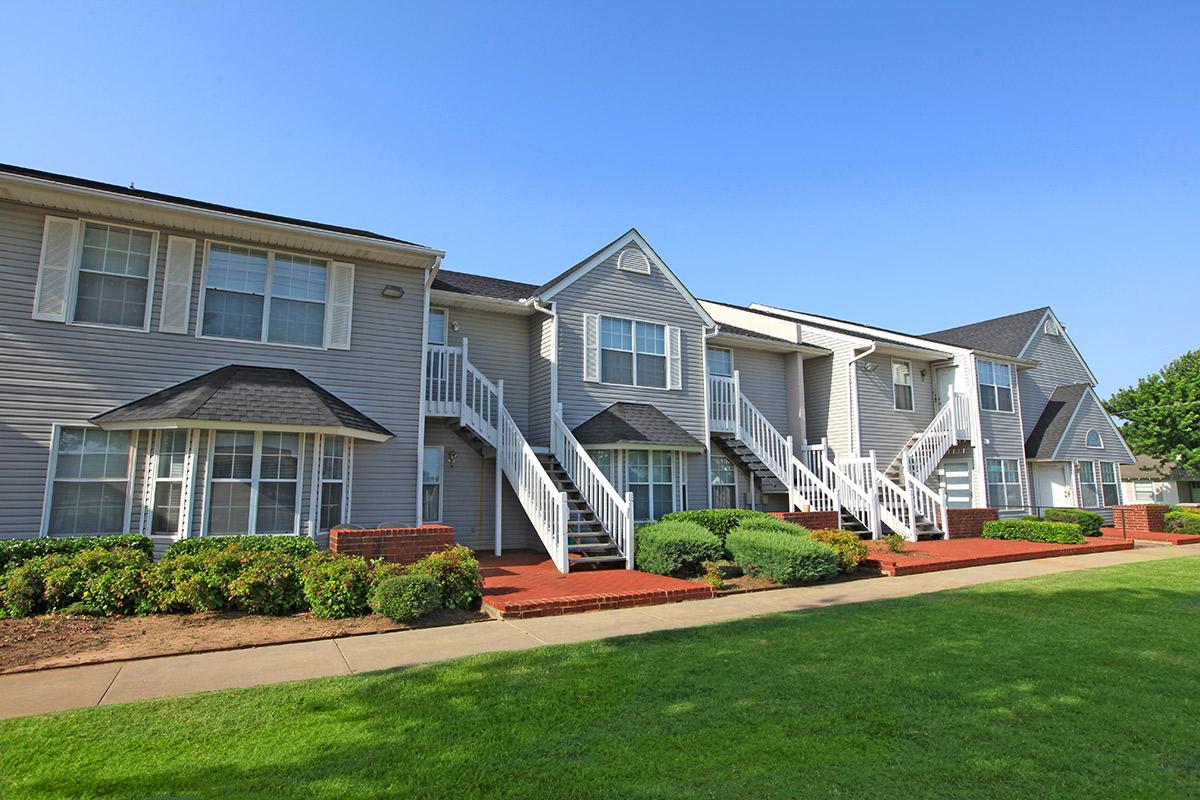 a large lawn in front of a house