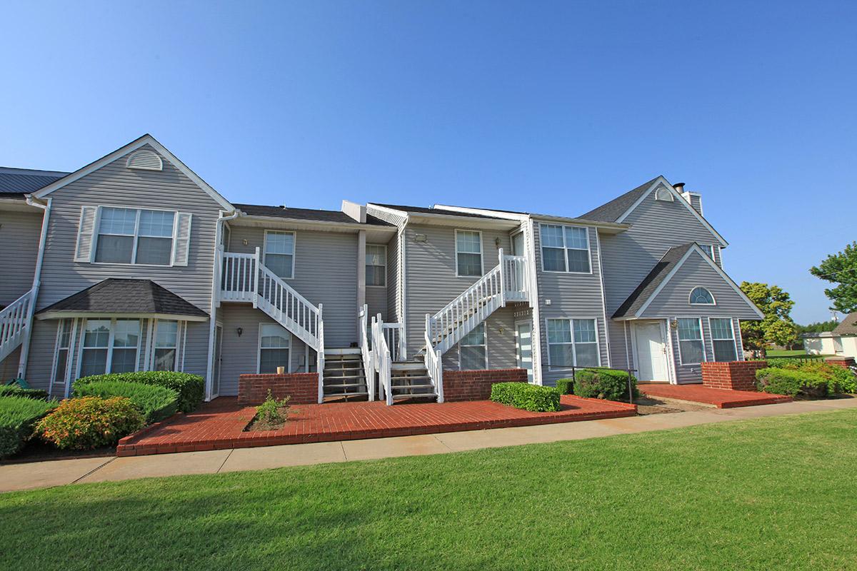 a large lawn in front of a house