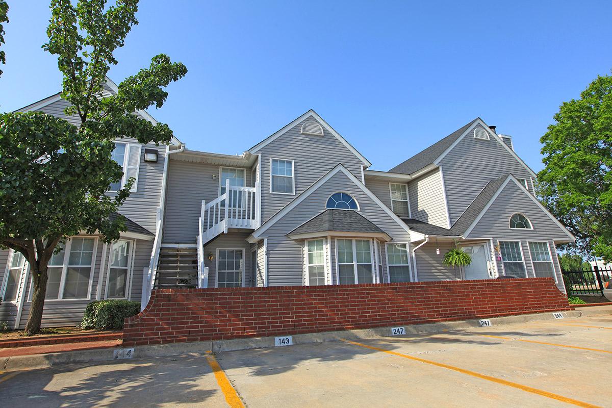 a house with trees in the background