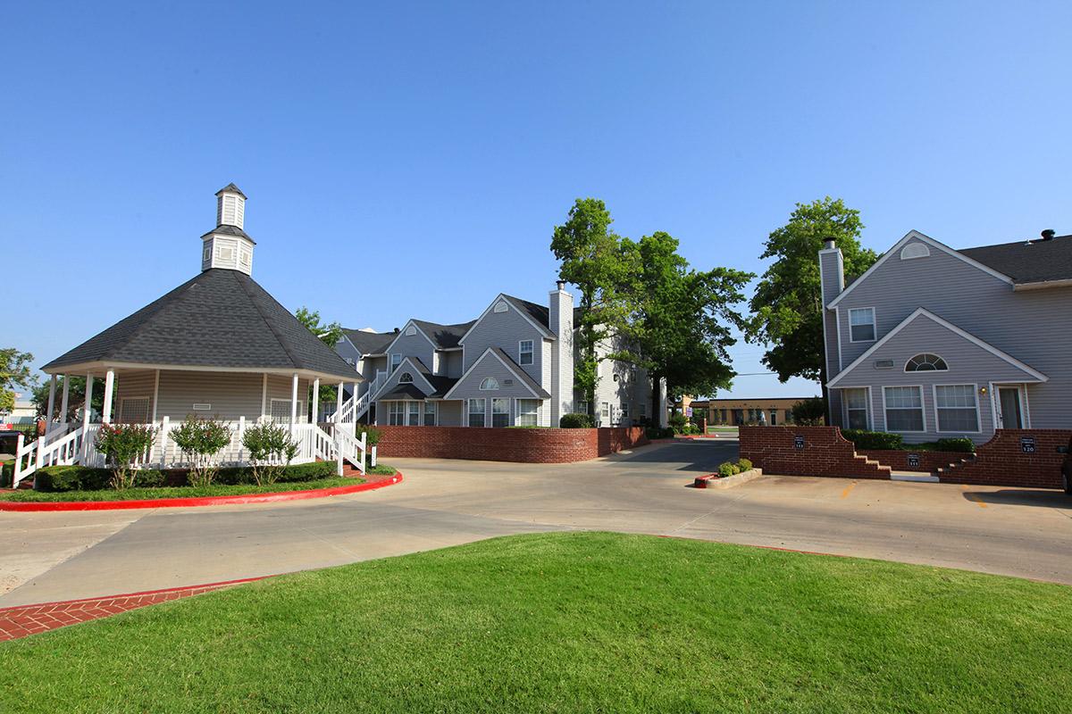 a close up of a street in front of a house