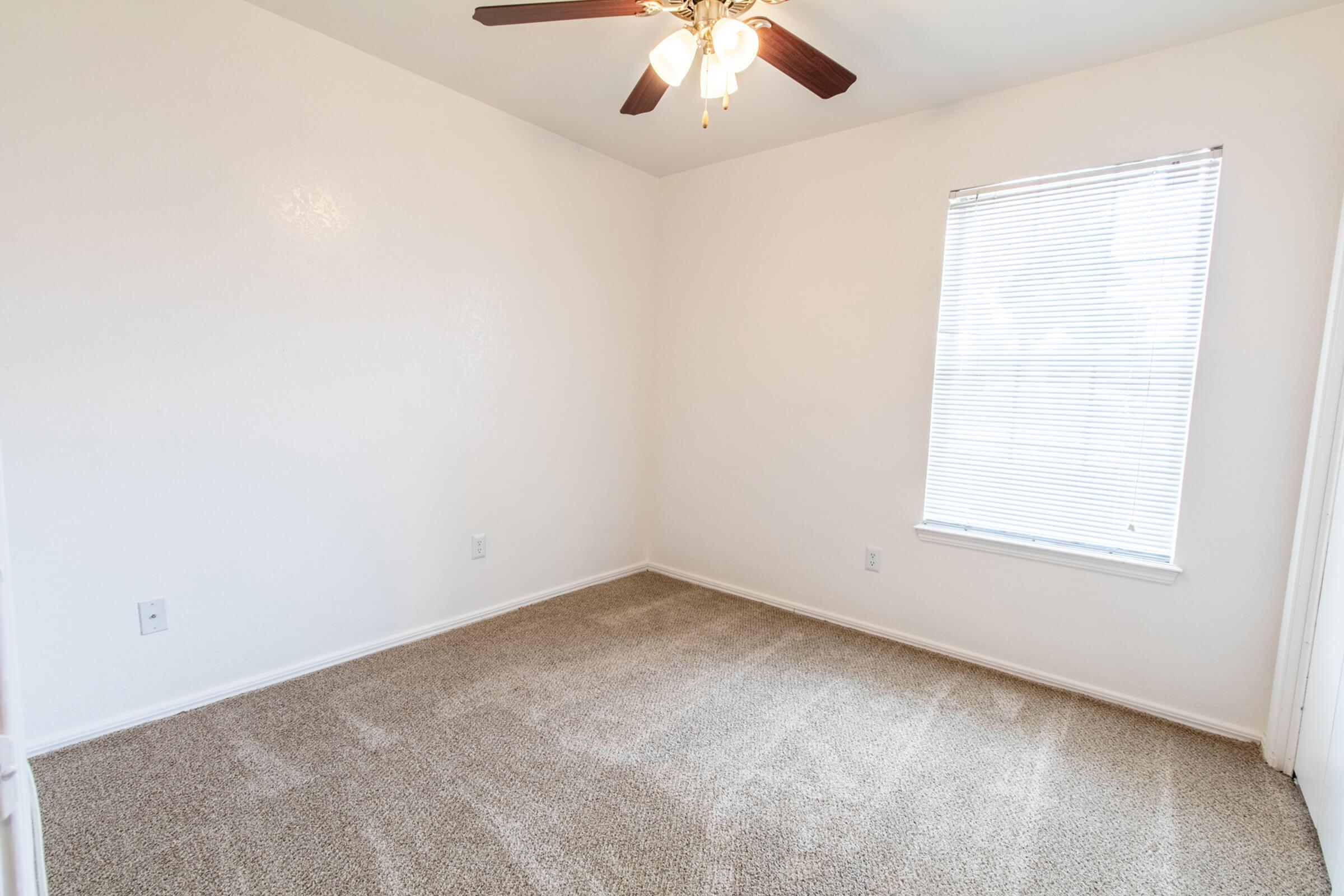 a room with a sink and a window