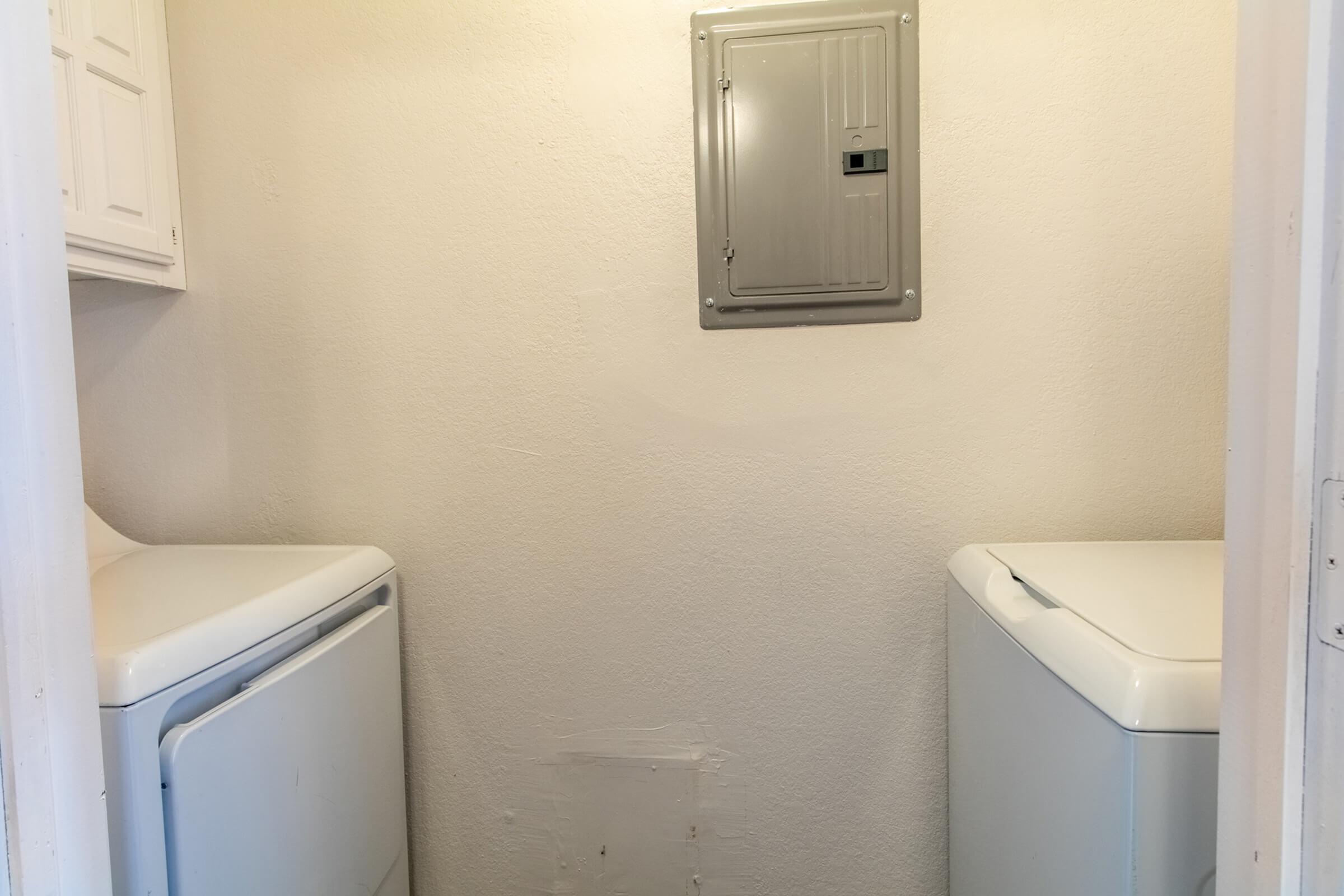 a kitchen with a sink and a mirror