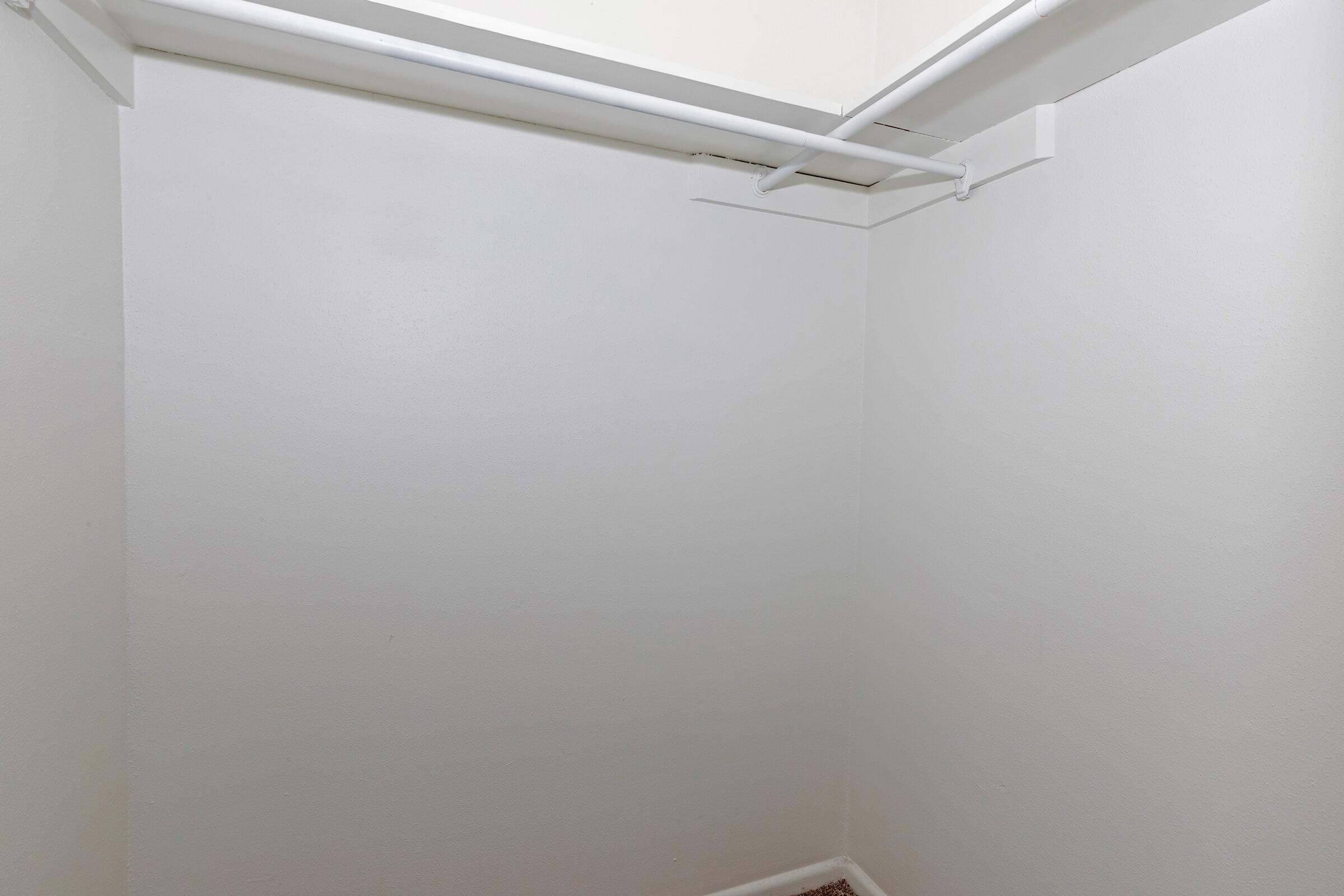 a white refrigerator freezer sitting in a room