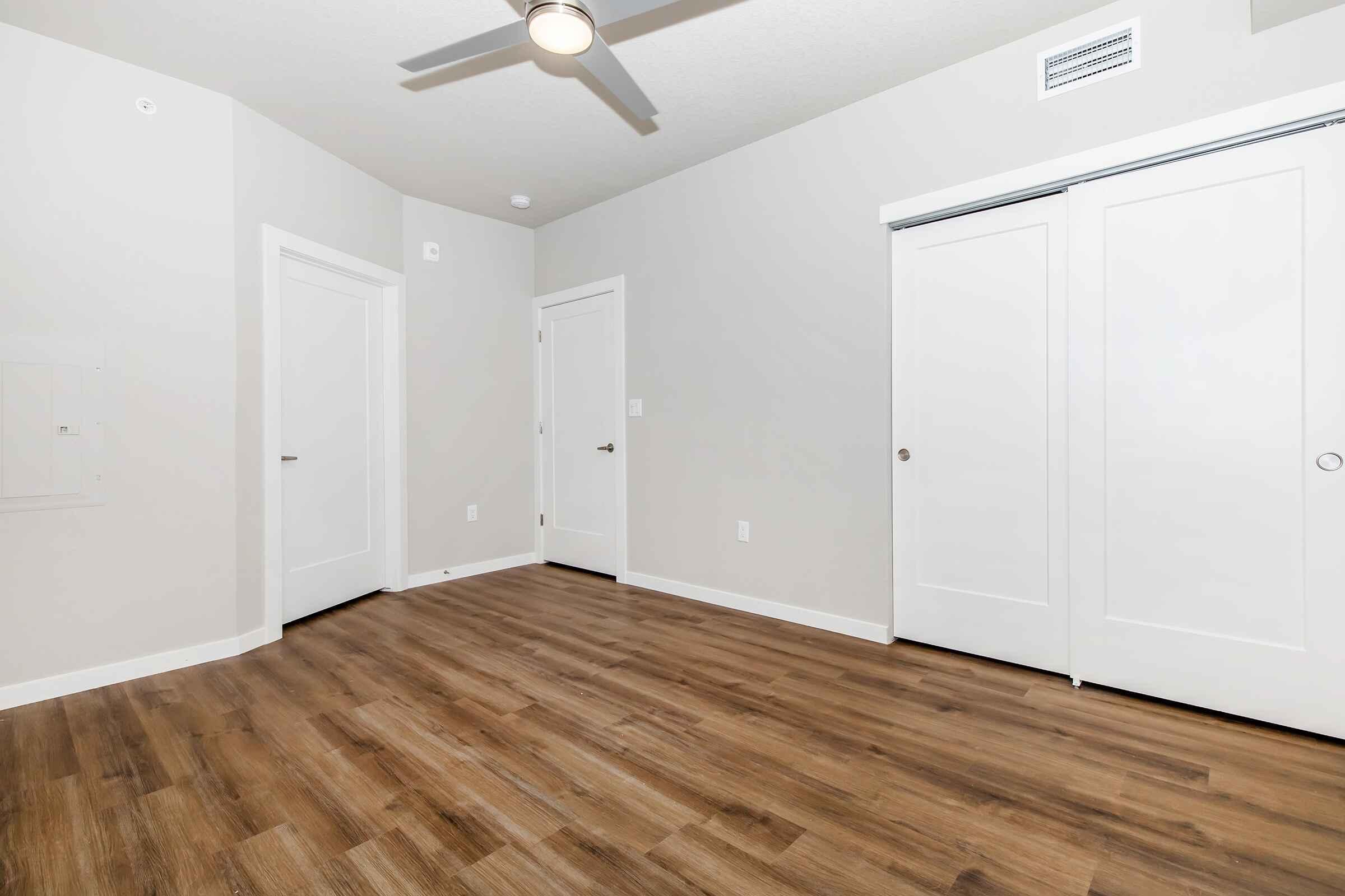 a kitchen with a wooden floor