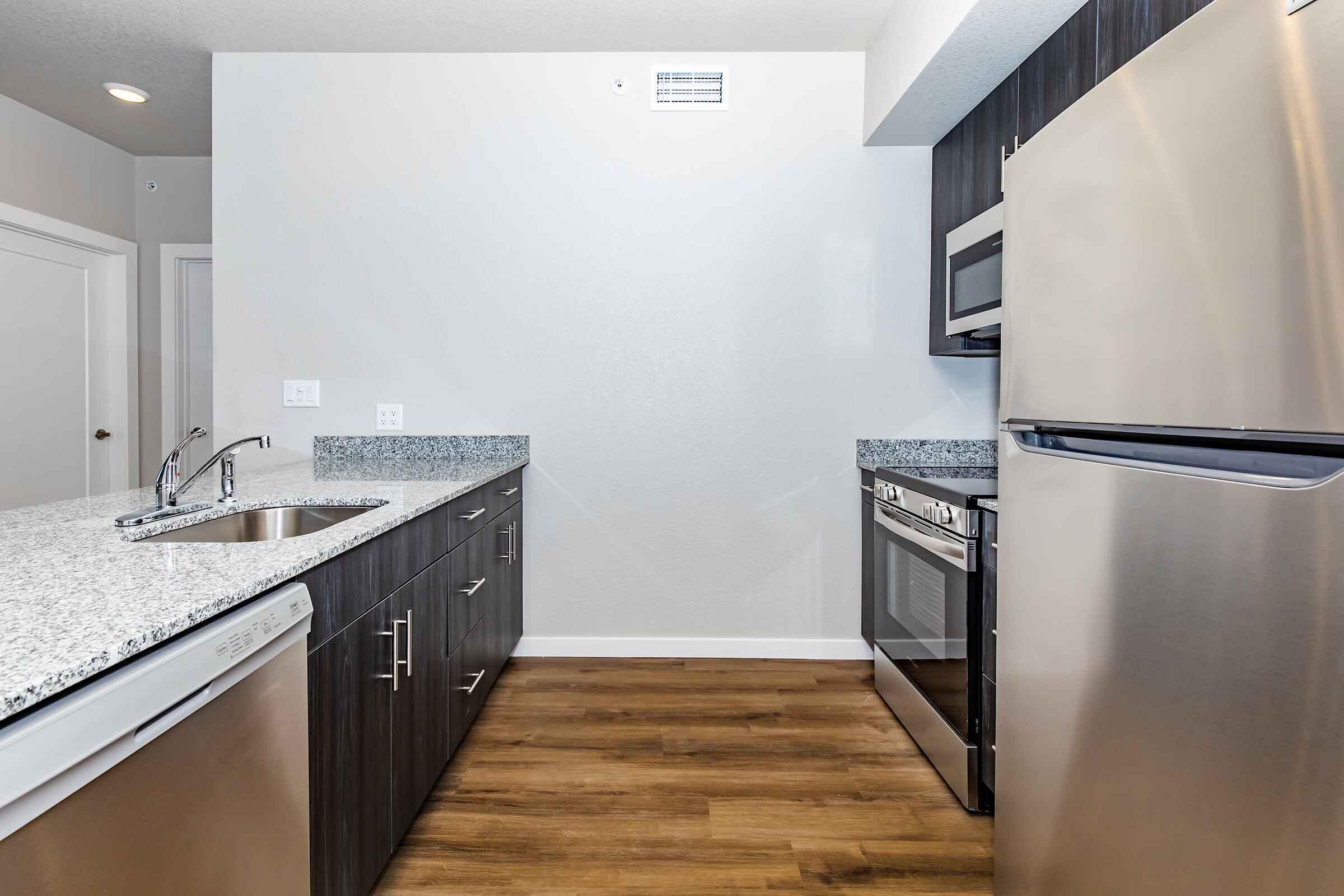 a stainless steel refrigerator in a kitchen