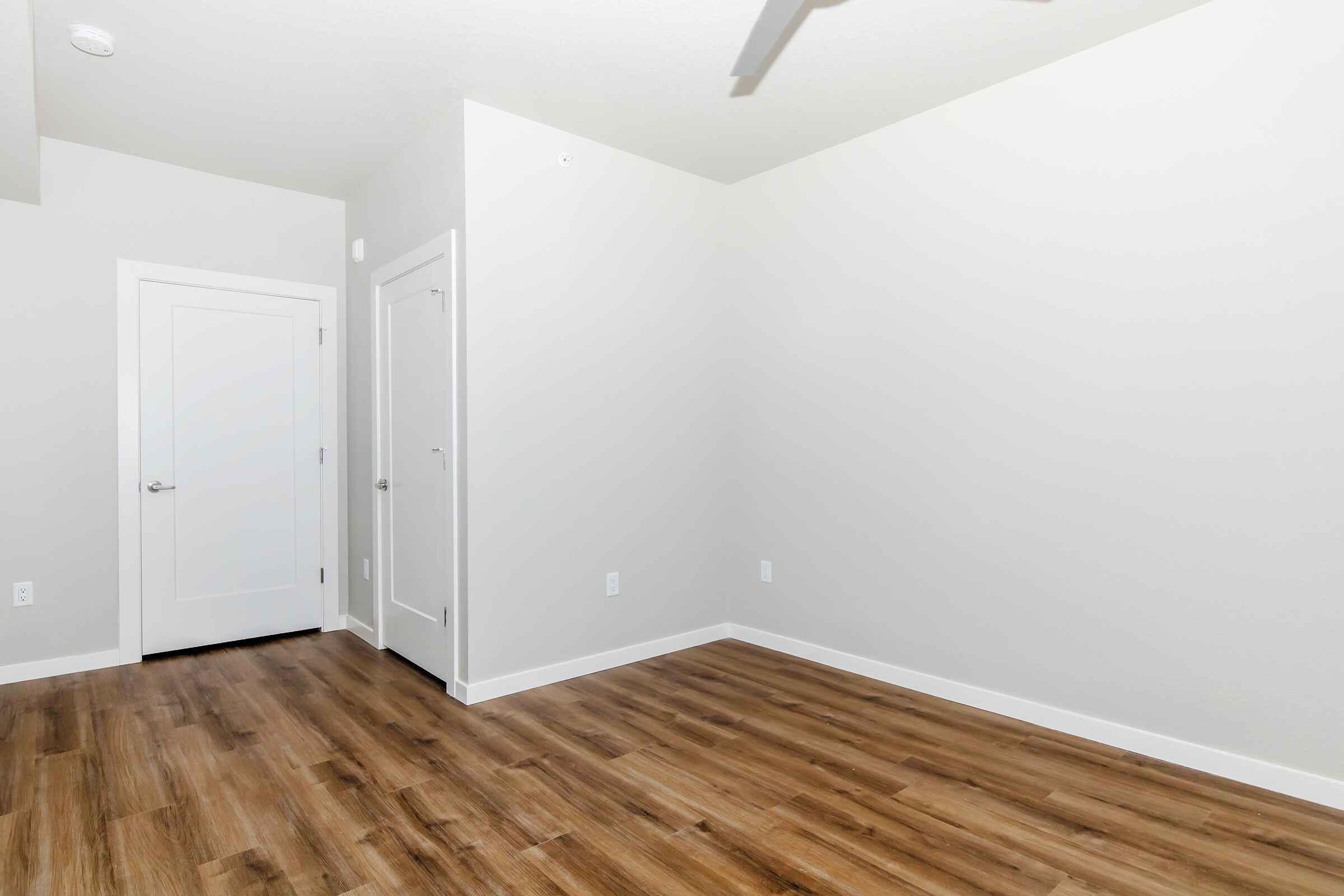 a kitchen with a wood floor