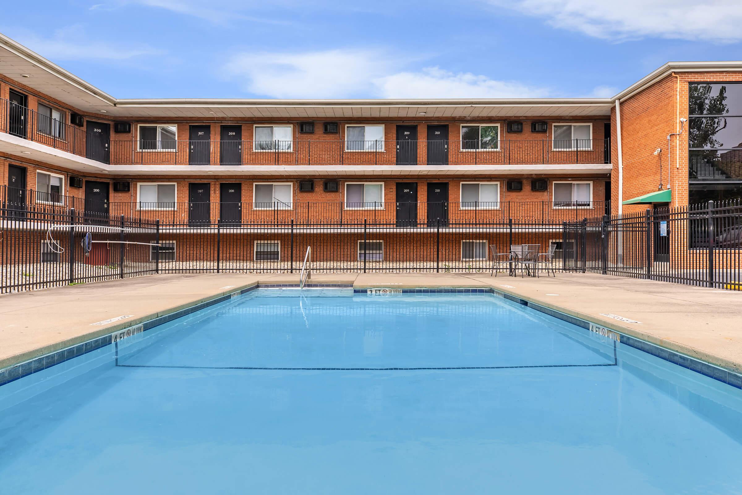 a pool of water in front of a building