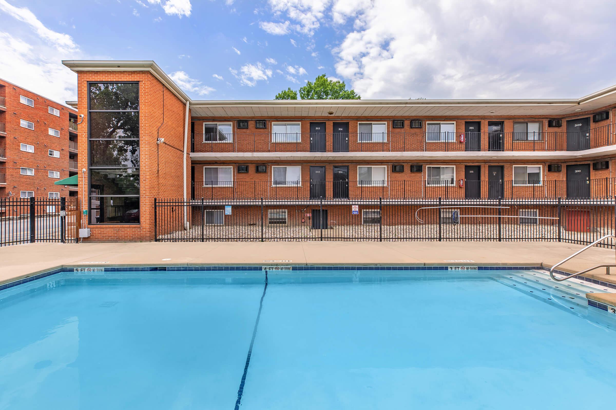 a large pool of water in front of a building