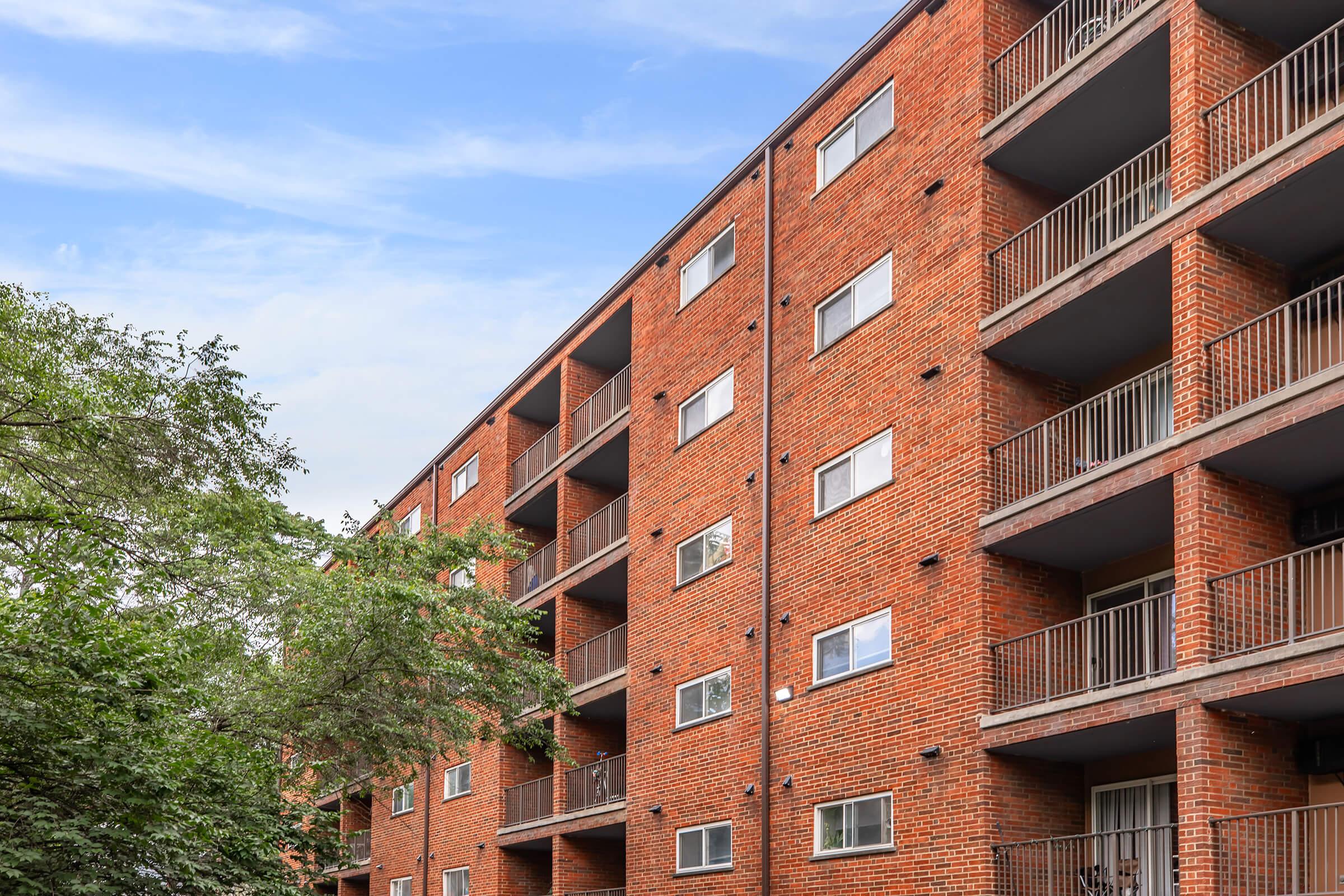 a tall brown brick building