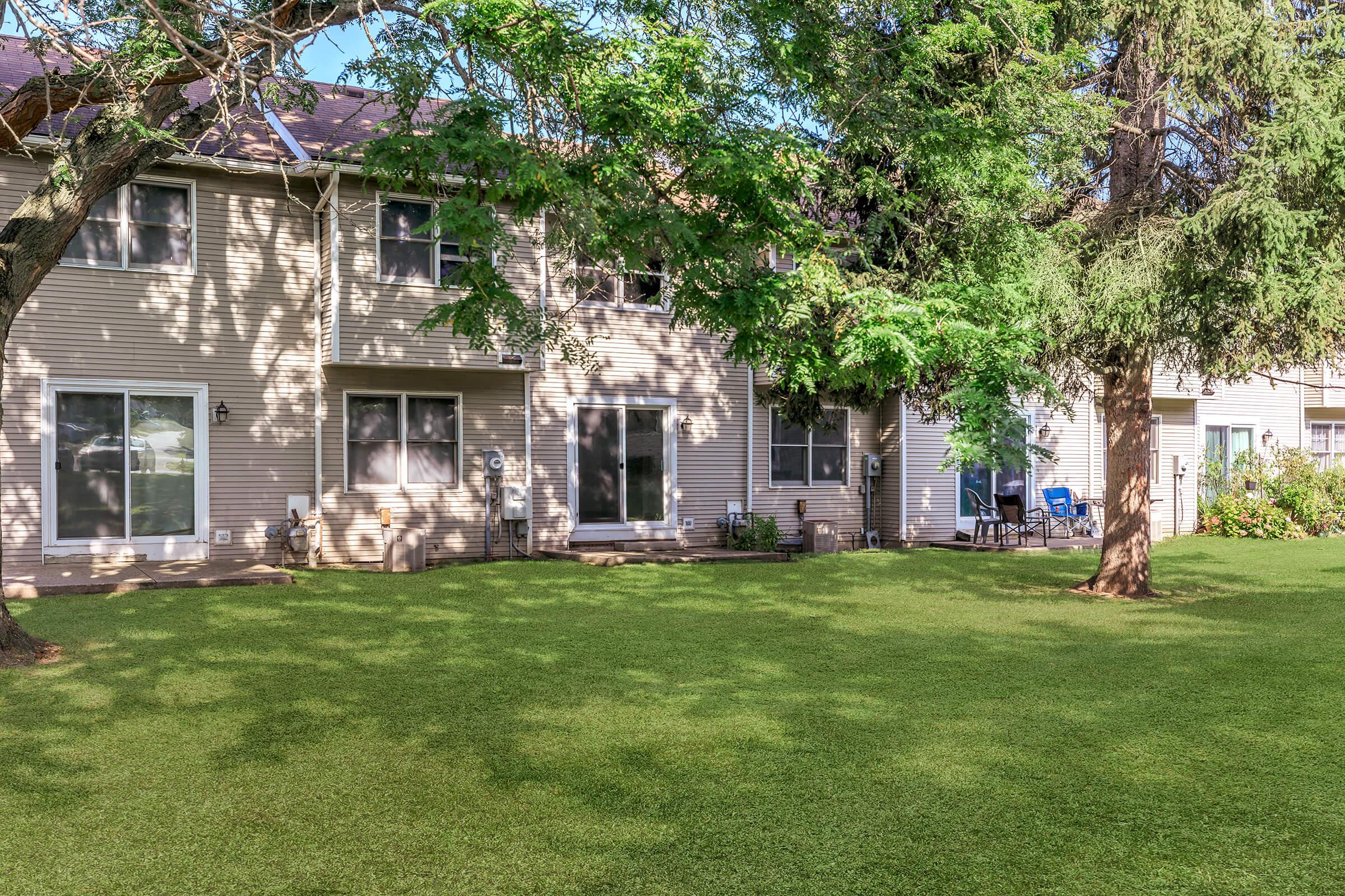 a large lawn in front of a house