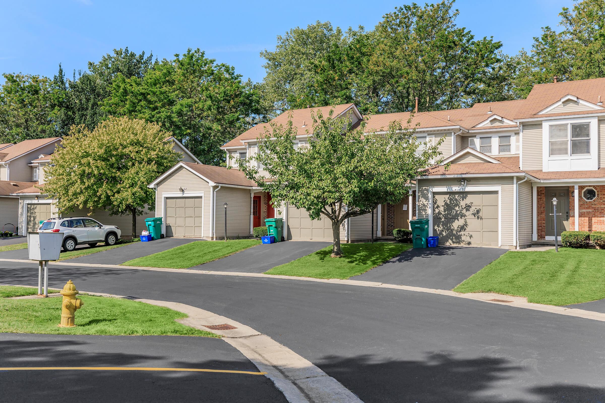 a residential street in front of a house