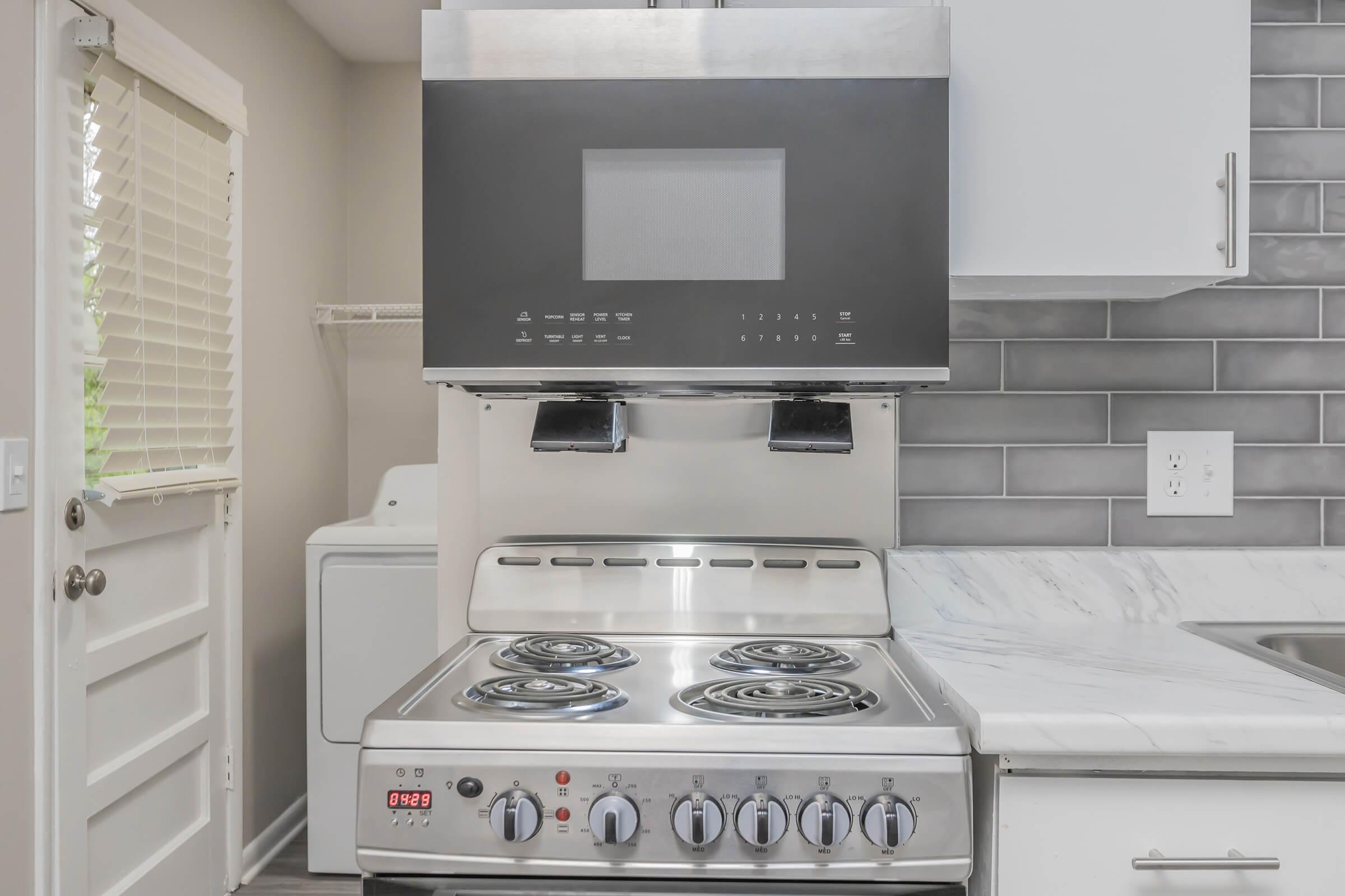 All-electric stainless steel stove in Hermitage apartment.