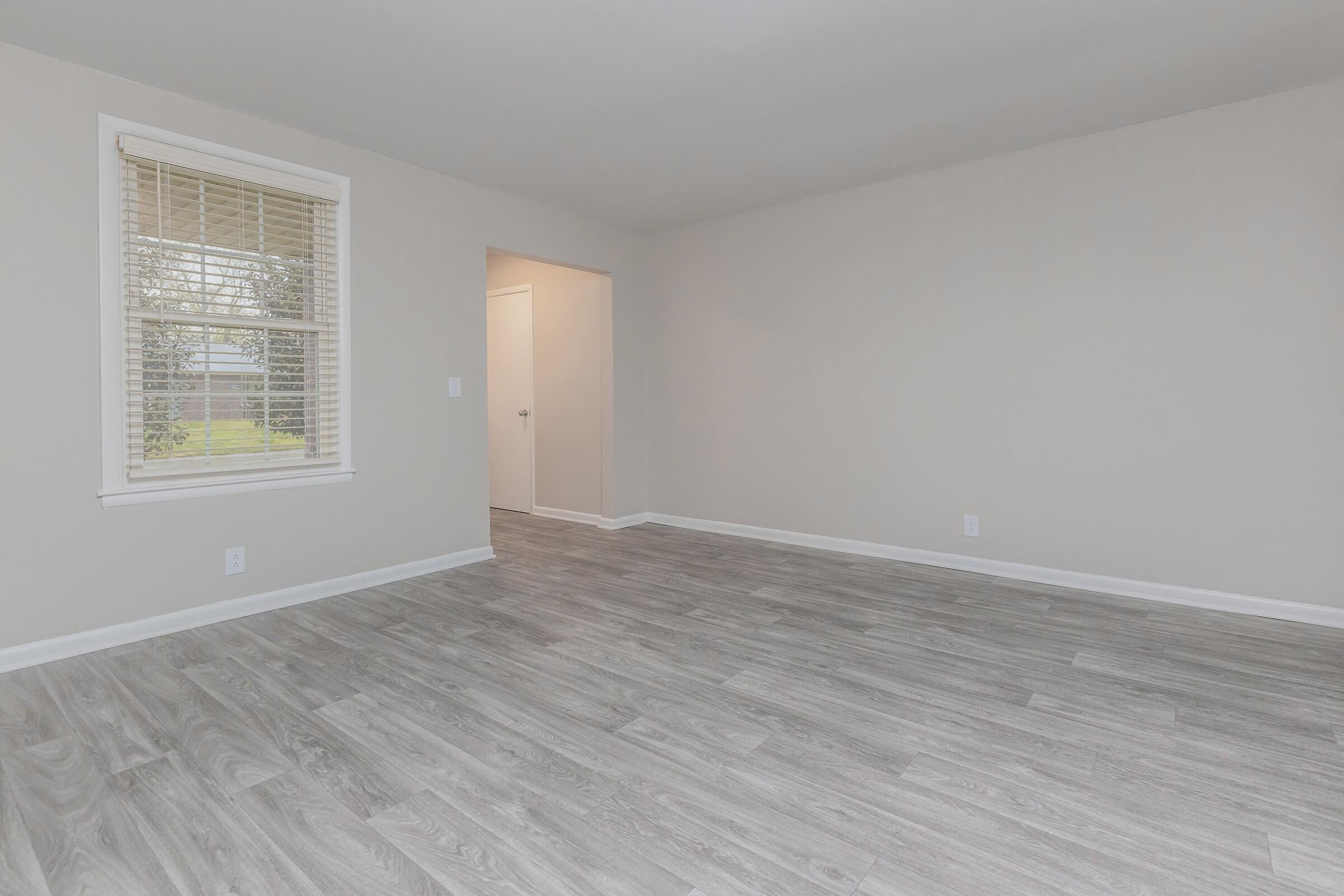 Spacious living room in The Nash apartment in Hermitage, TN.