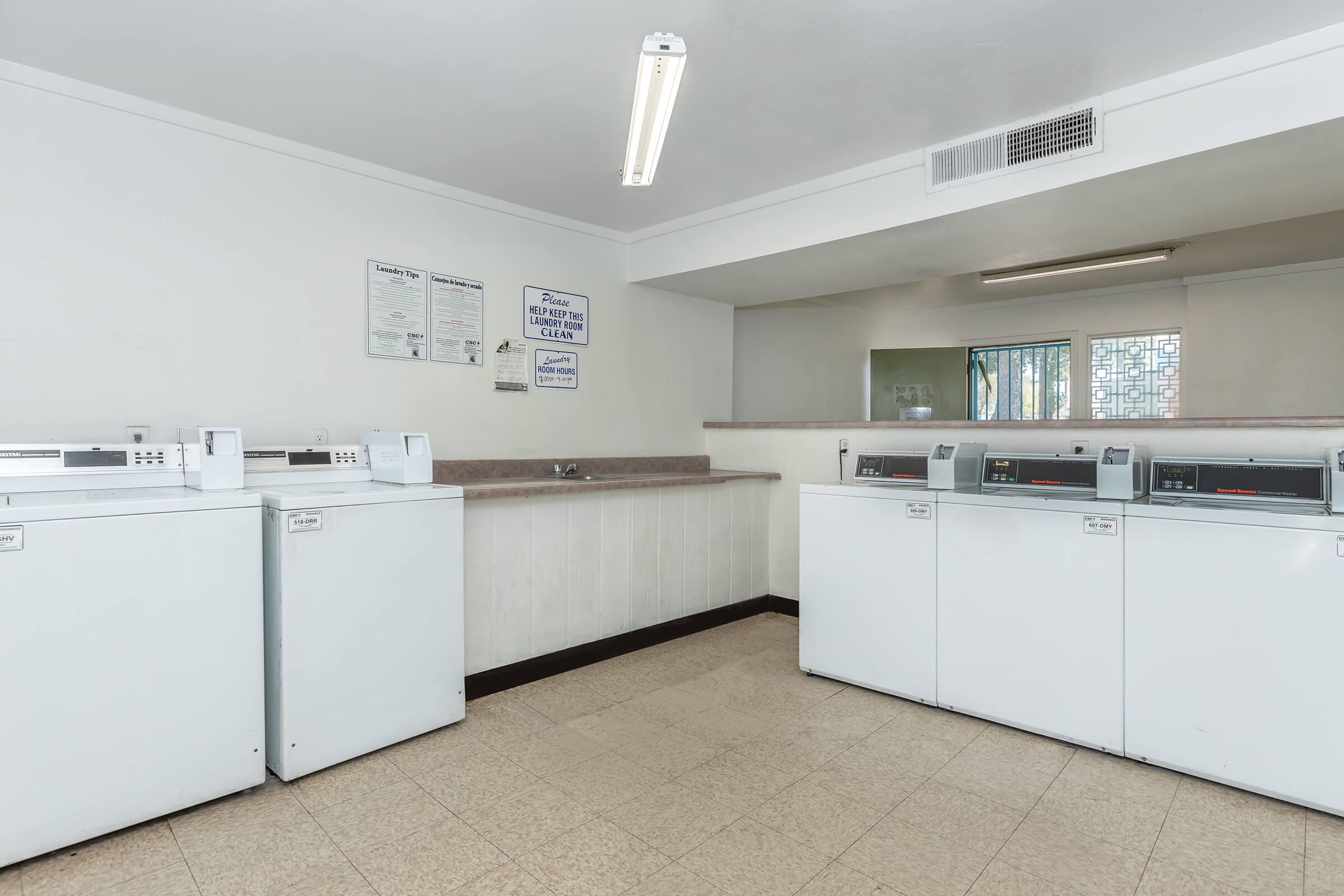 a kitchen with a stove and a refrigerator