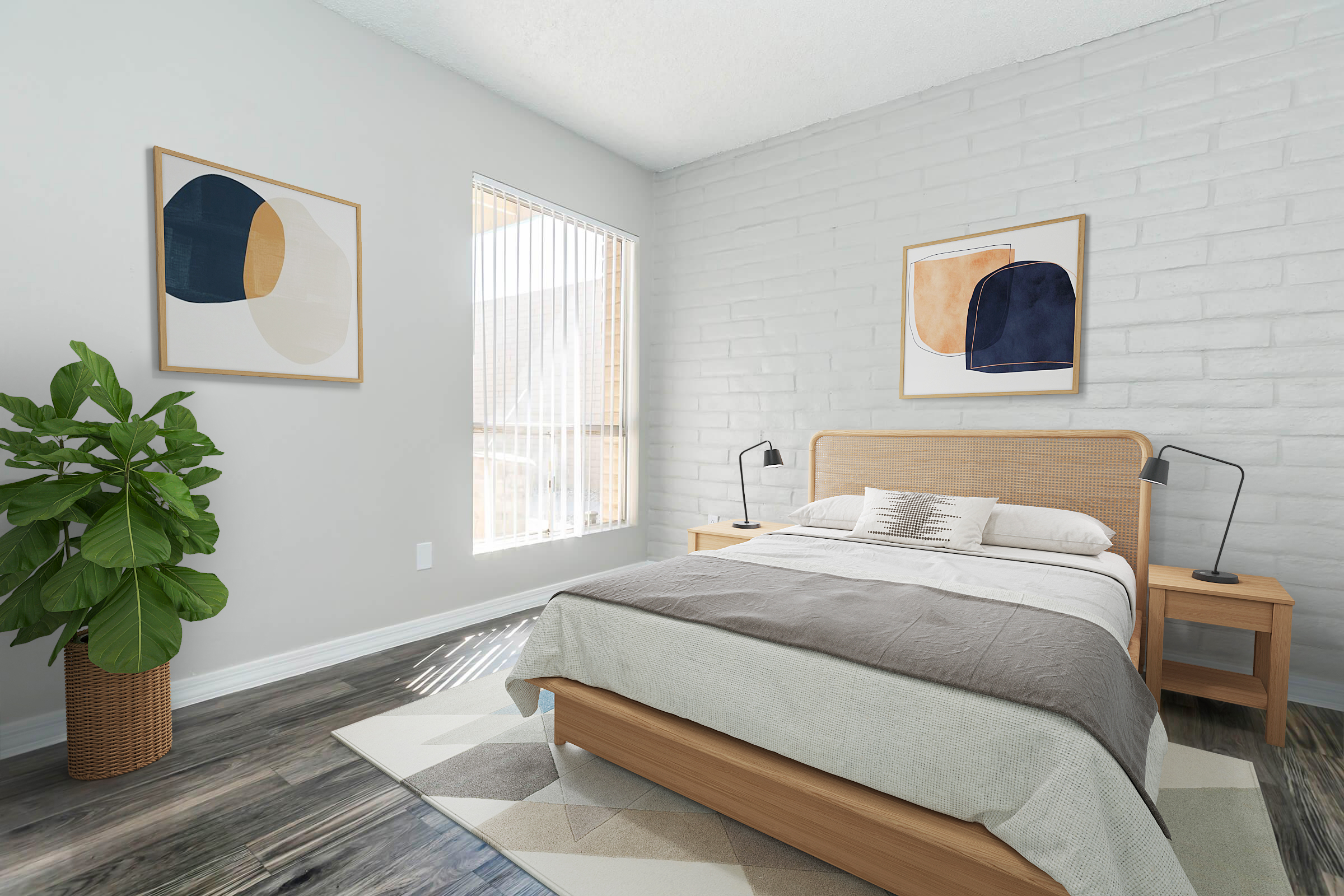 A modern bedroom featuring a wooden bed with gray bedding, two bedside lamps, and framed abstract art on the walls. A large window with vertical blinds lets in natural light, and a potted plant adds a touch of greenery. The room has light gray walls and a stylish area rug on the dark wood floor.