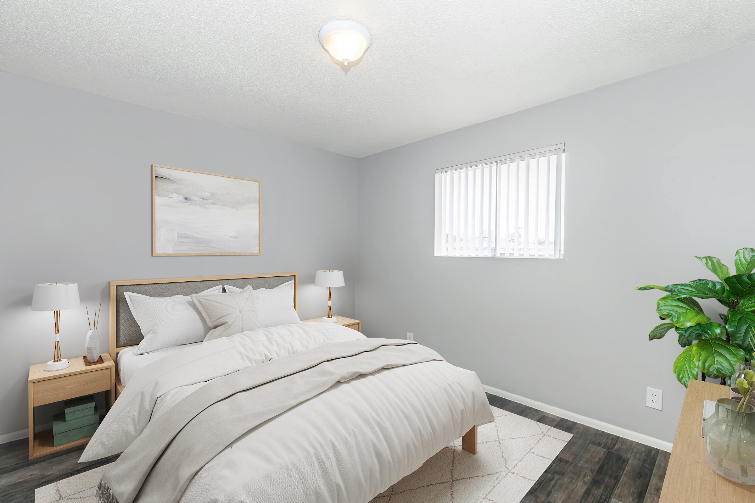 A cozy, well-lit bedroom featuring a light gray color scheme. The room includes a neatly made bed with neutral bedding, two bedside tables with lamps, and a wall-mounted artwork. A window with white blinds lets in natural light, and a green plant adds a touch of freshness to the space.