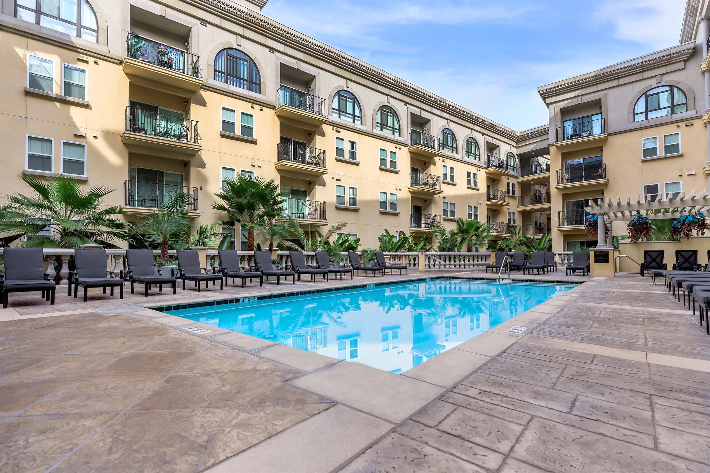 a pool next to a building