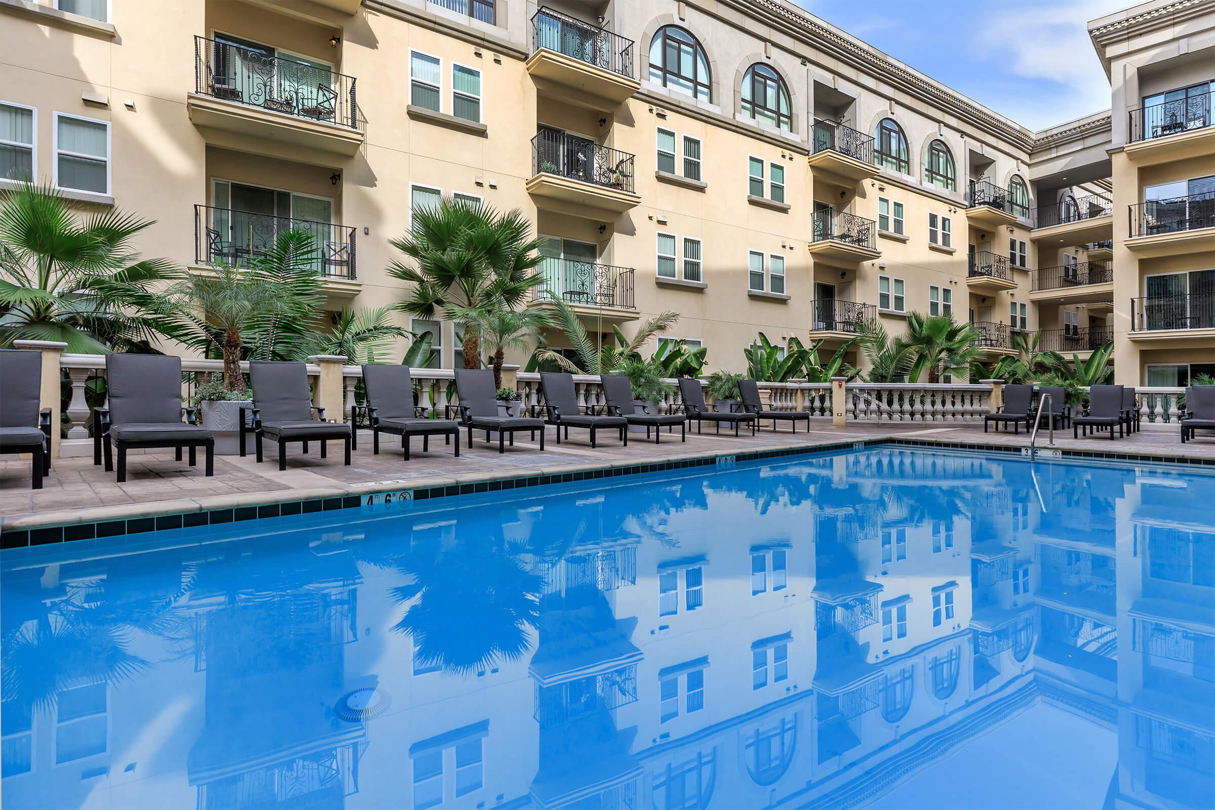 a large pool of water in front of a building