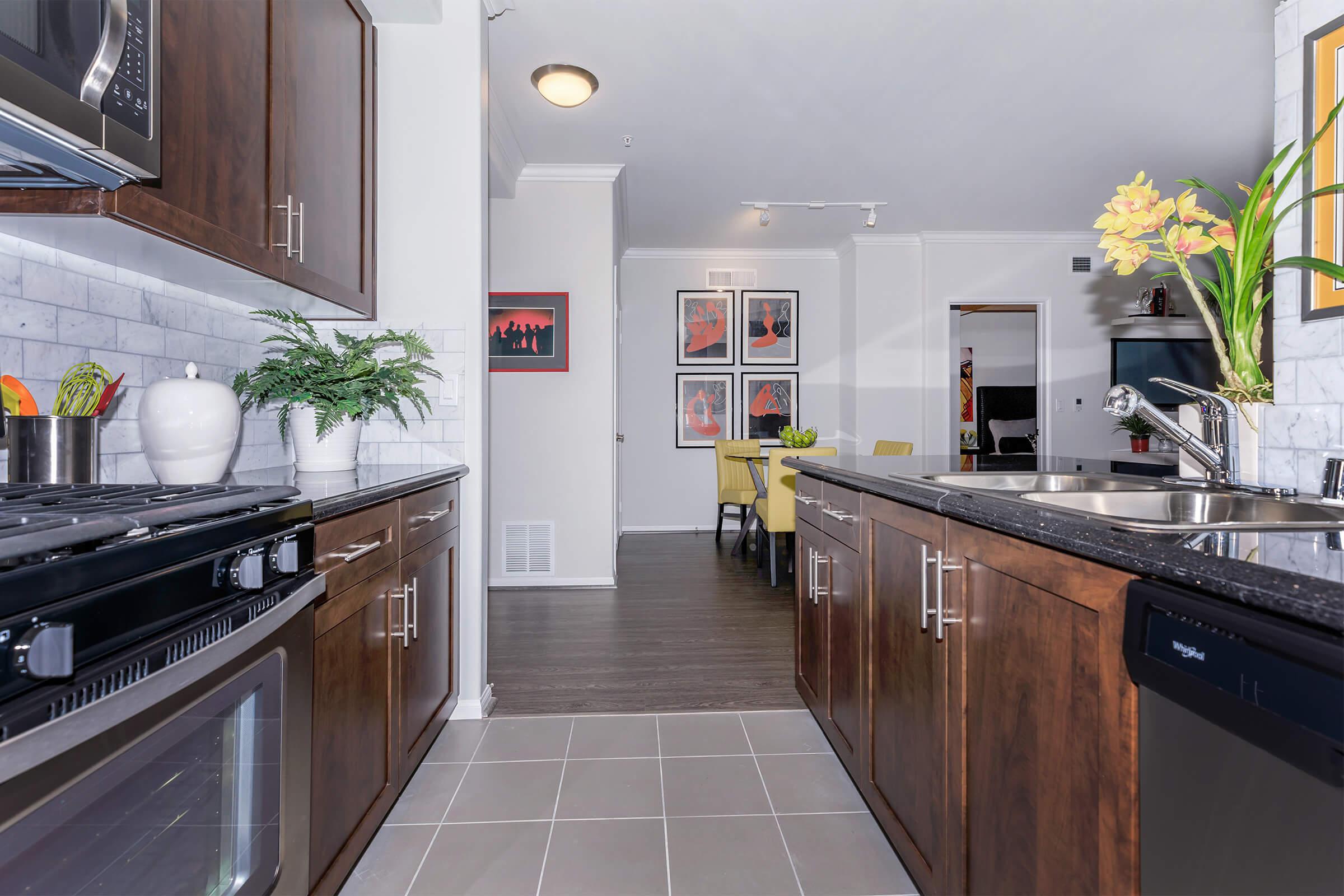 a modern kitchen with stainless steel appliances