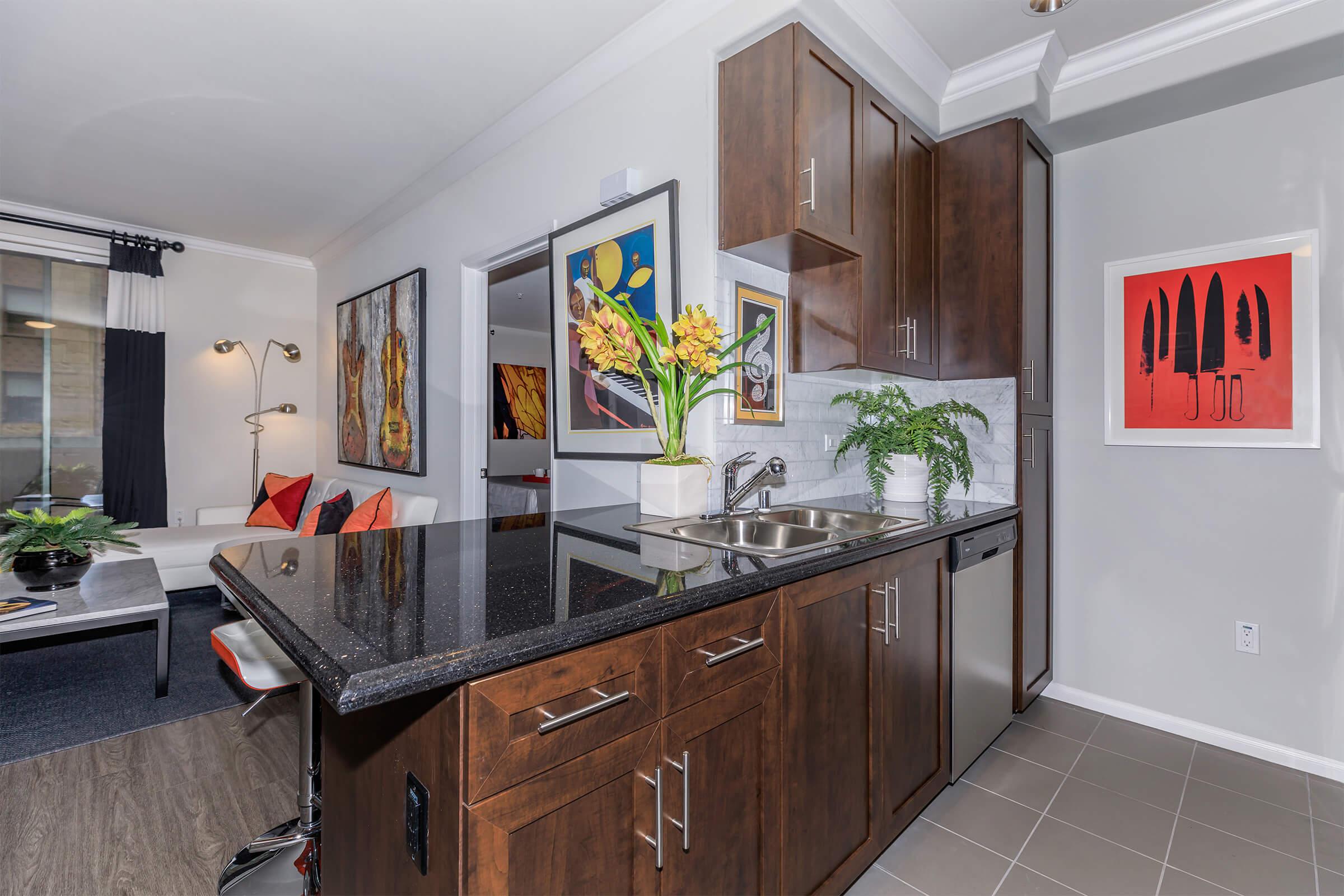 a kitchen with a sink and a window