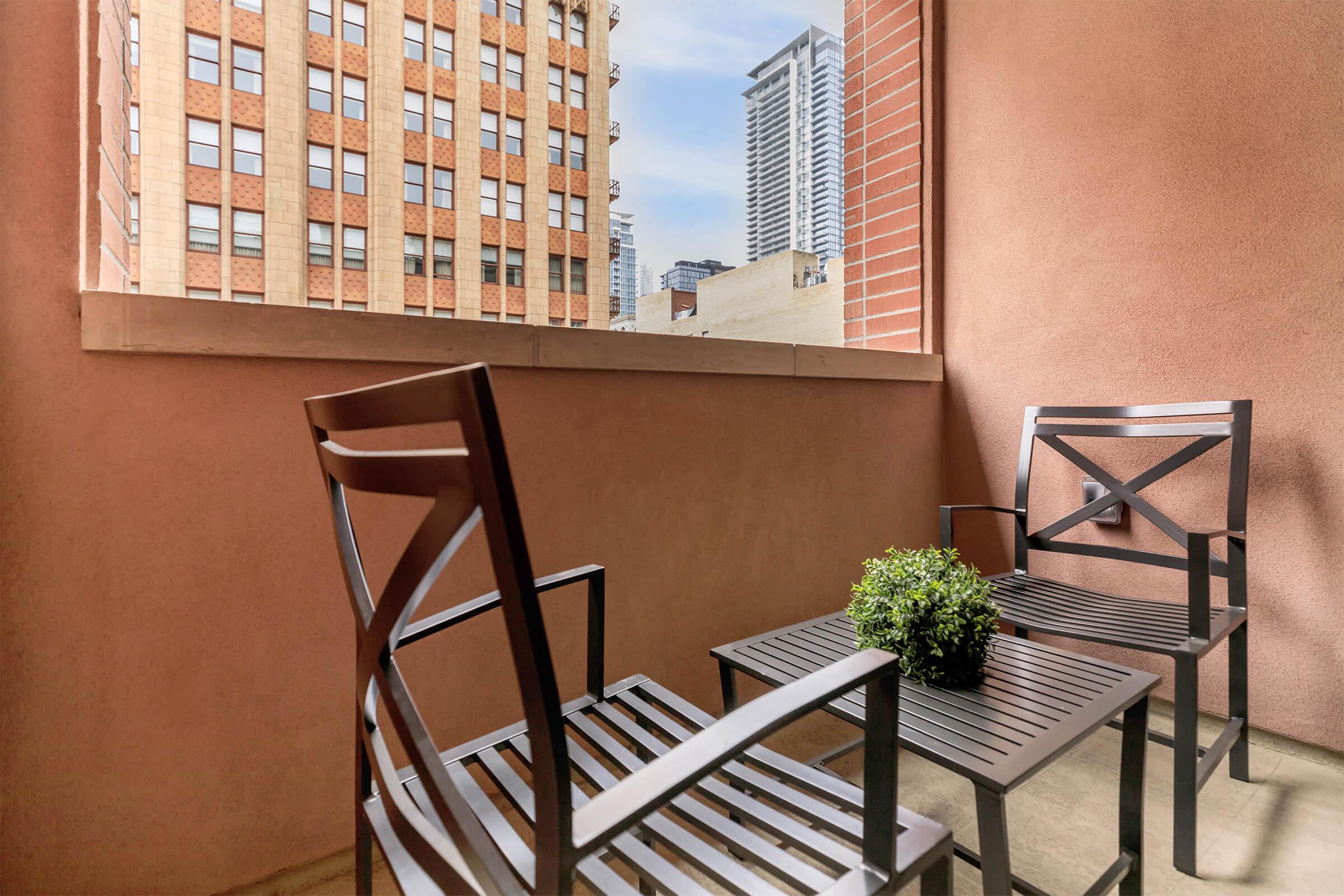 a dining room table in front of a building