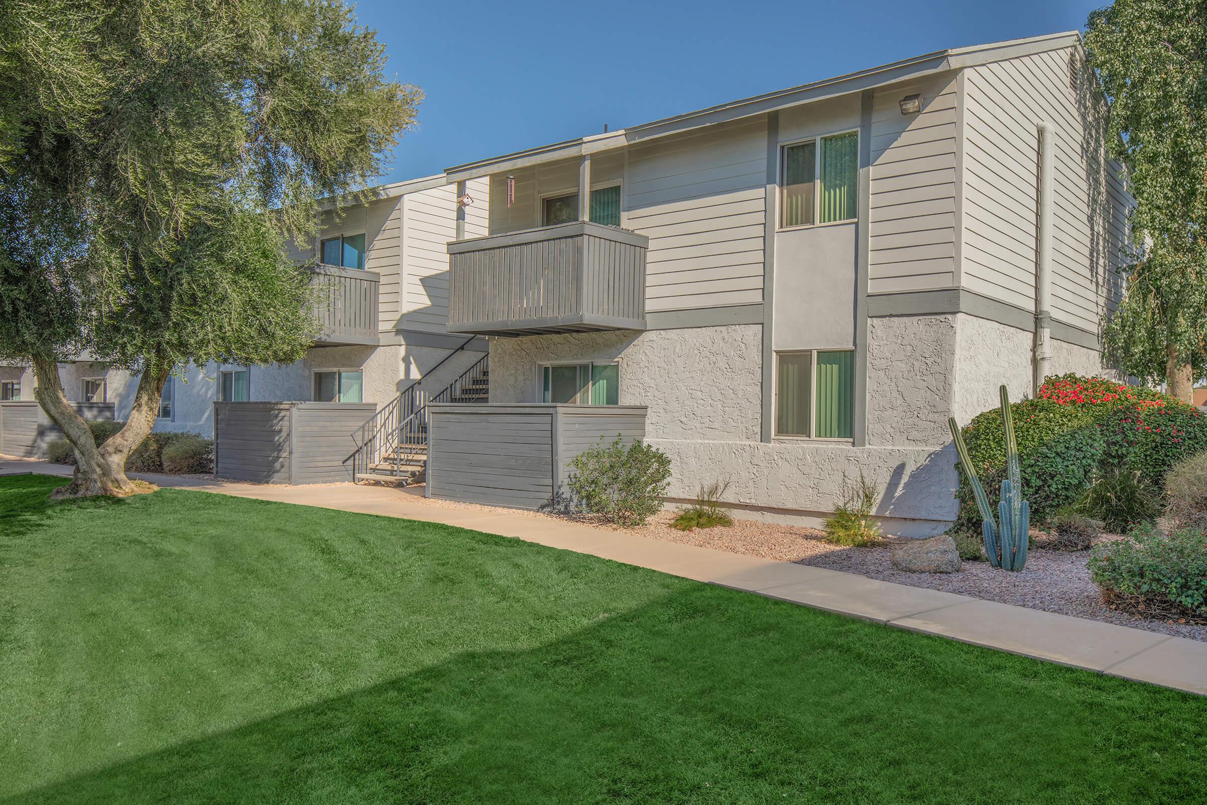 a large lawn in front of a house