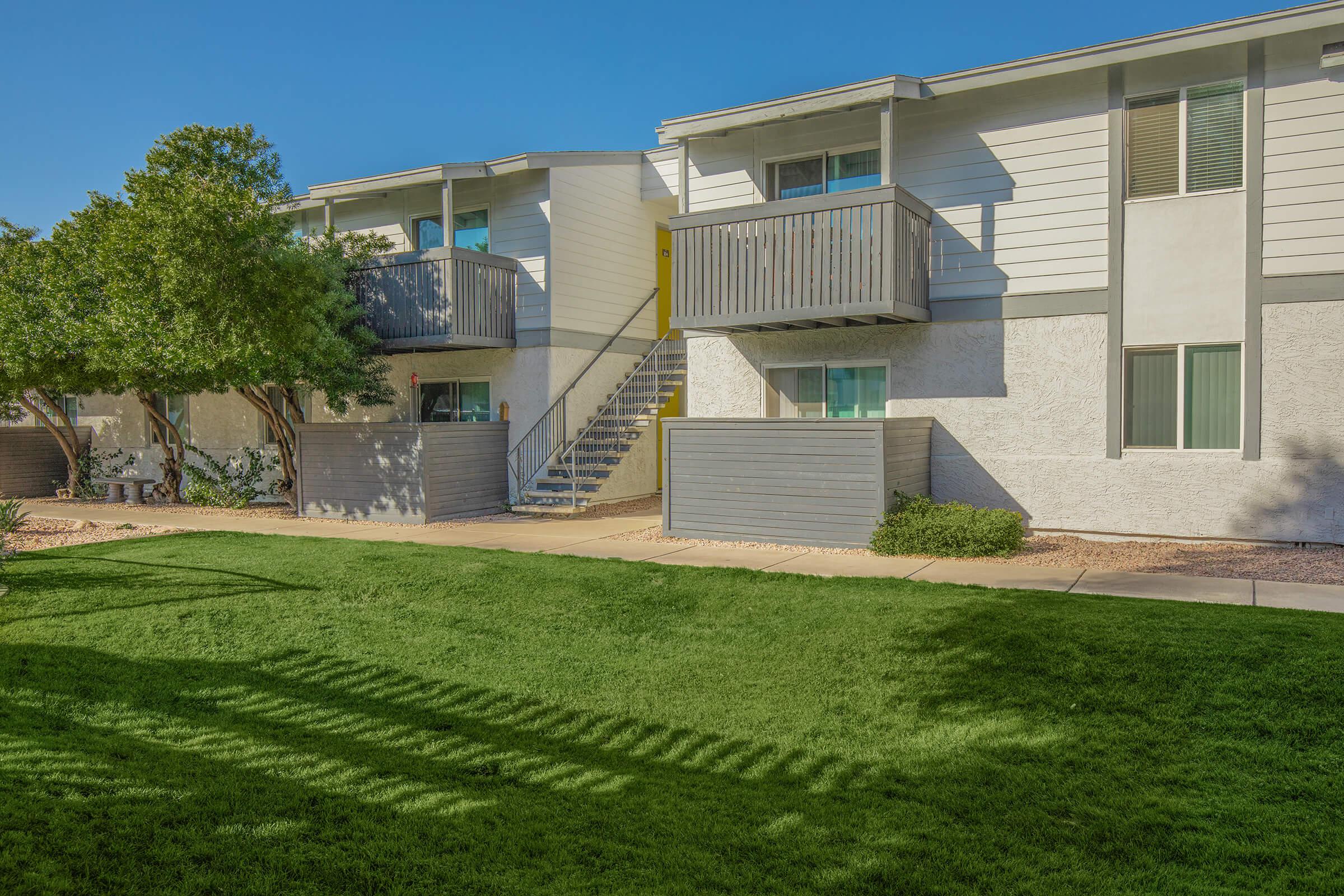 a large lawn in front of a building