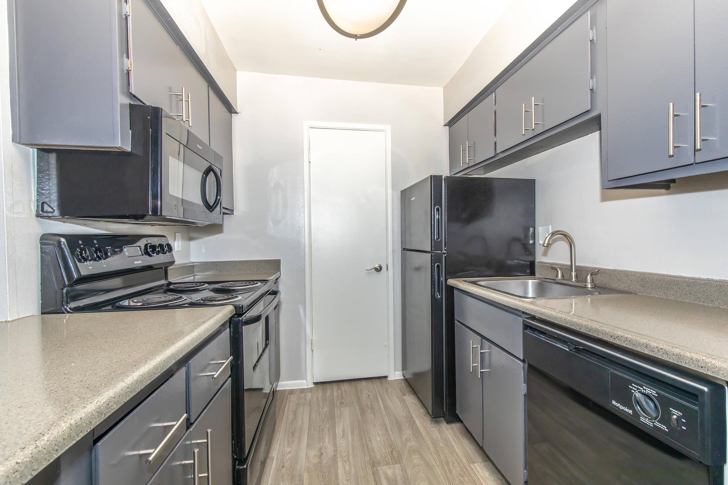 a kitchen with stainless steel appliances