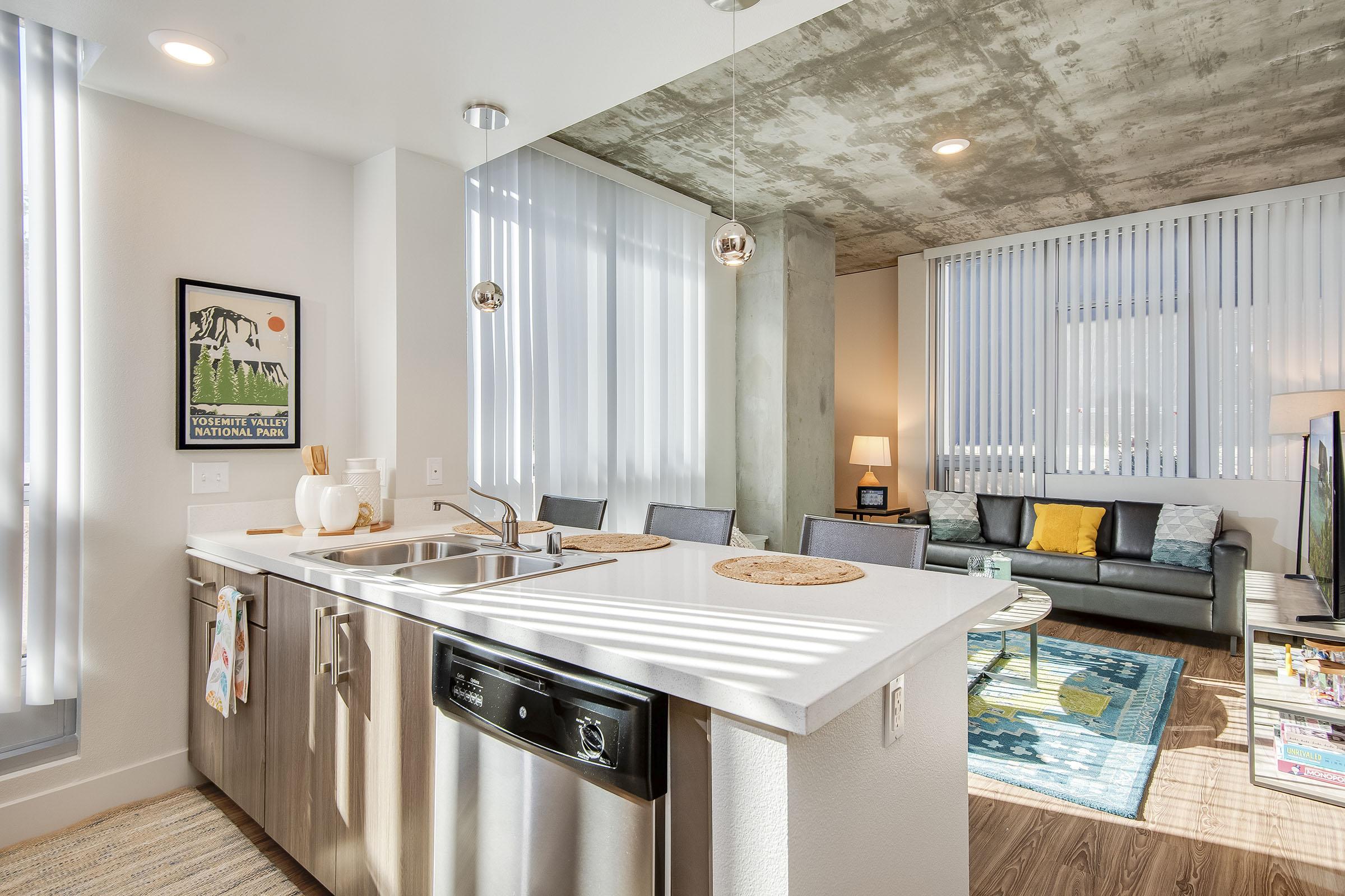 a kitchen with a sink and a window