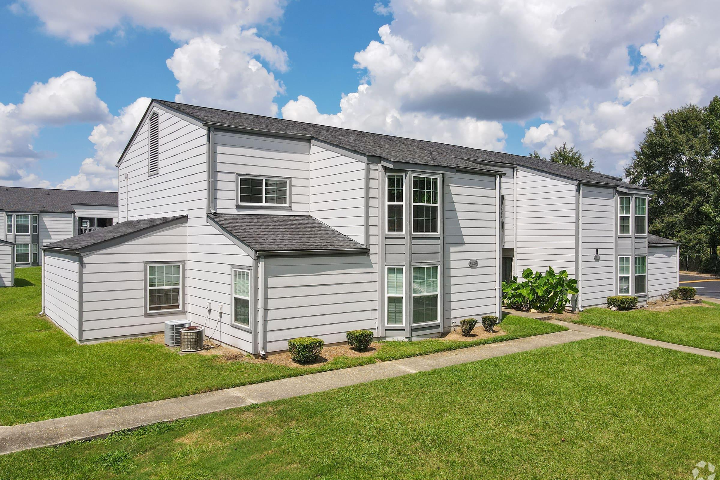 a large lawn in front of a house