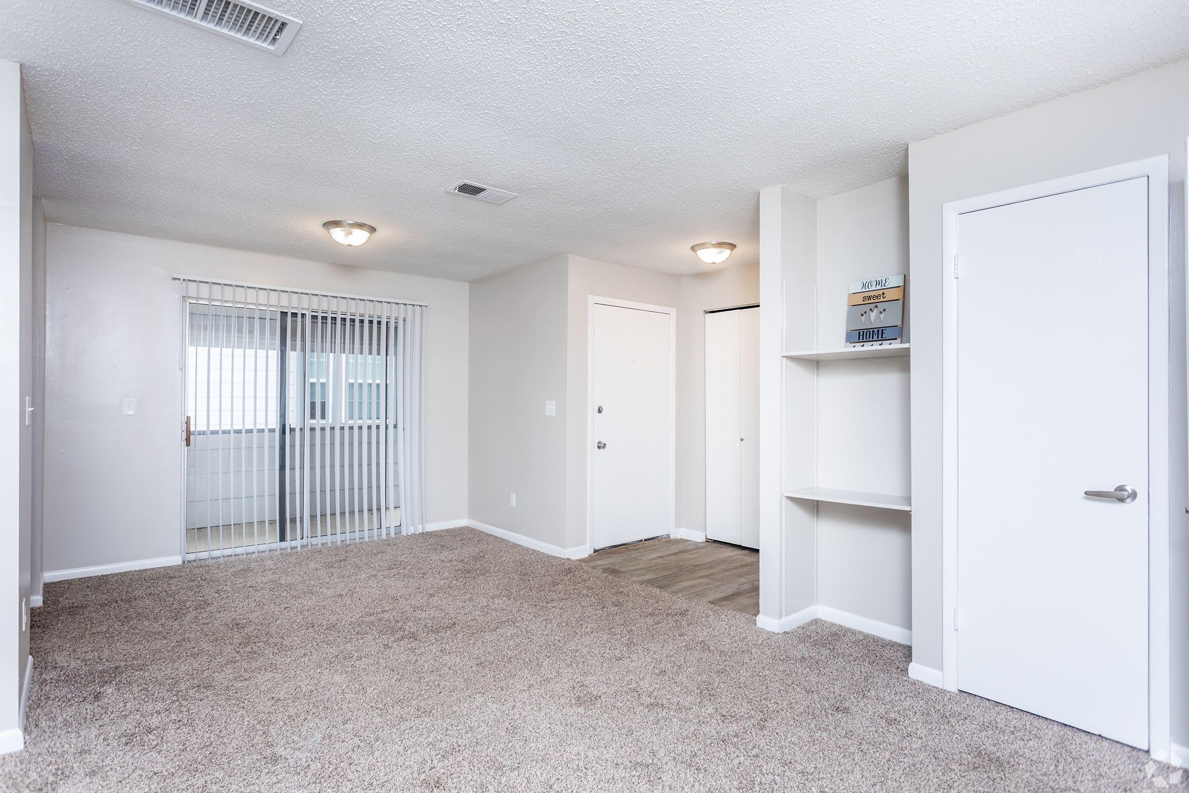 a room filled with furniture and a flat screen tv