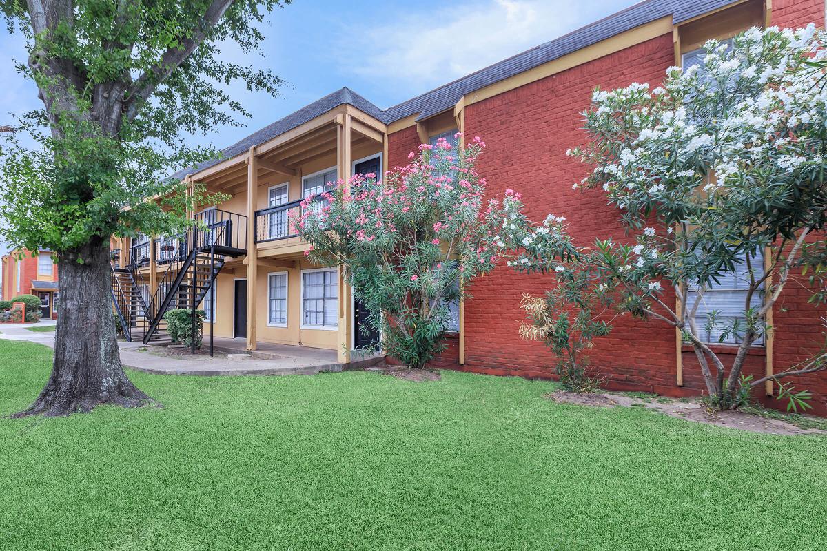 a large lawn in front of a house