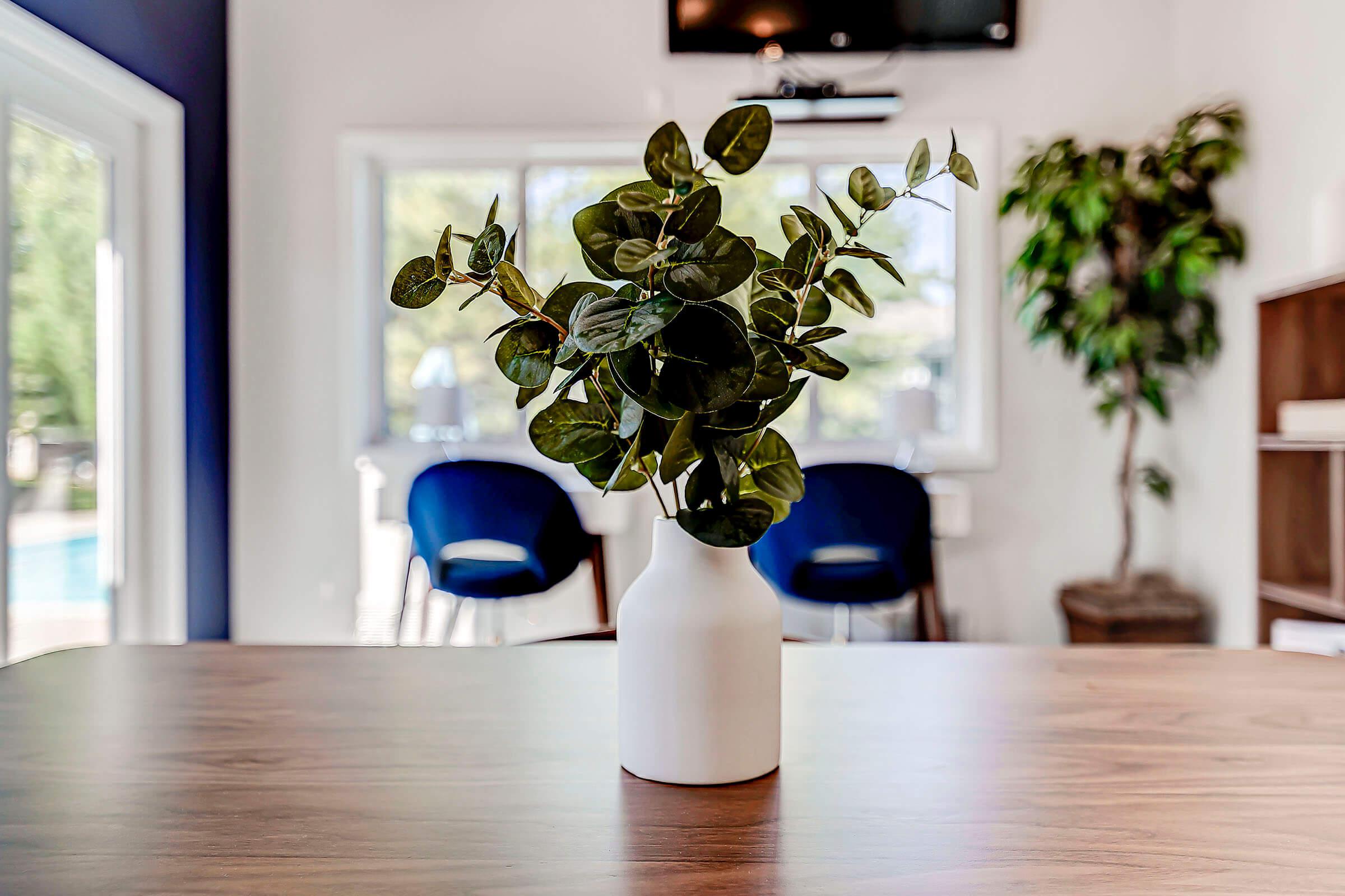 a vase of flowers on a table