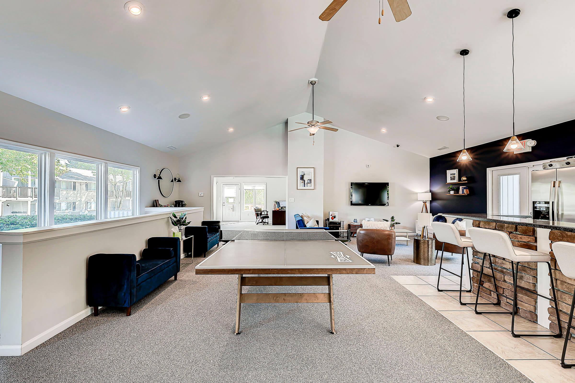 a room filled with furniture and a table