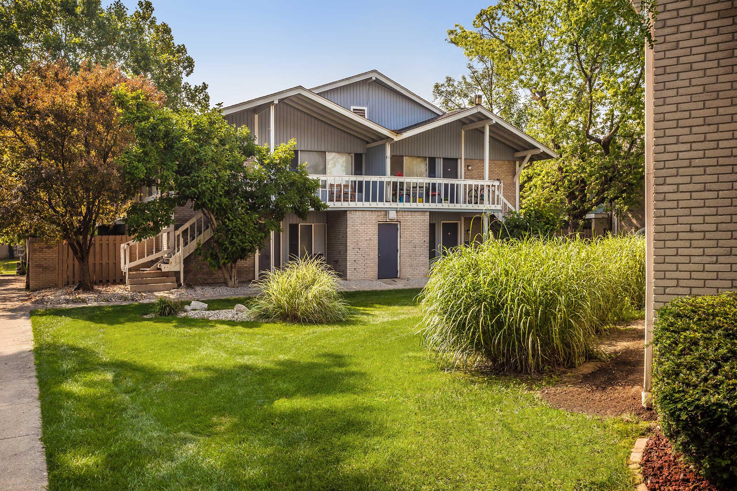 a large lawn in front of a house