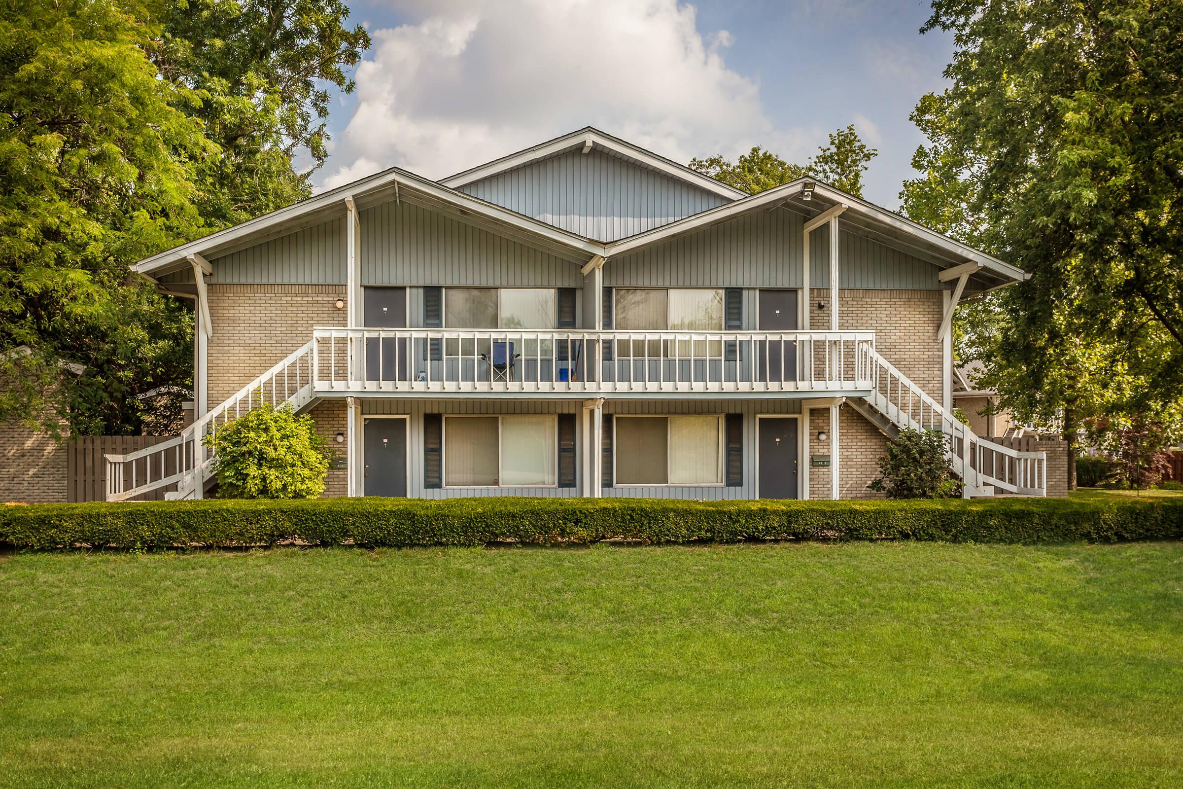 a large lawn in front of a house