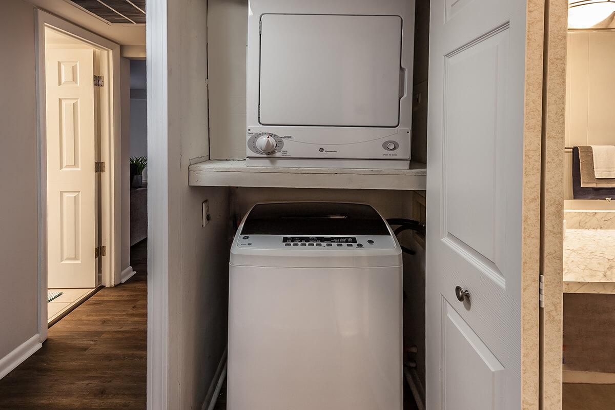 a white refrigerator freezer sitting in a room