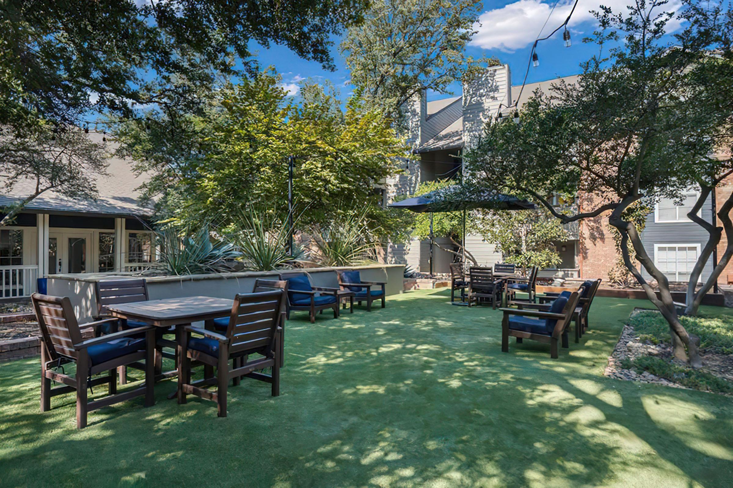 a group of lawn chairs sitting on top of a picnic table