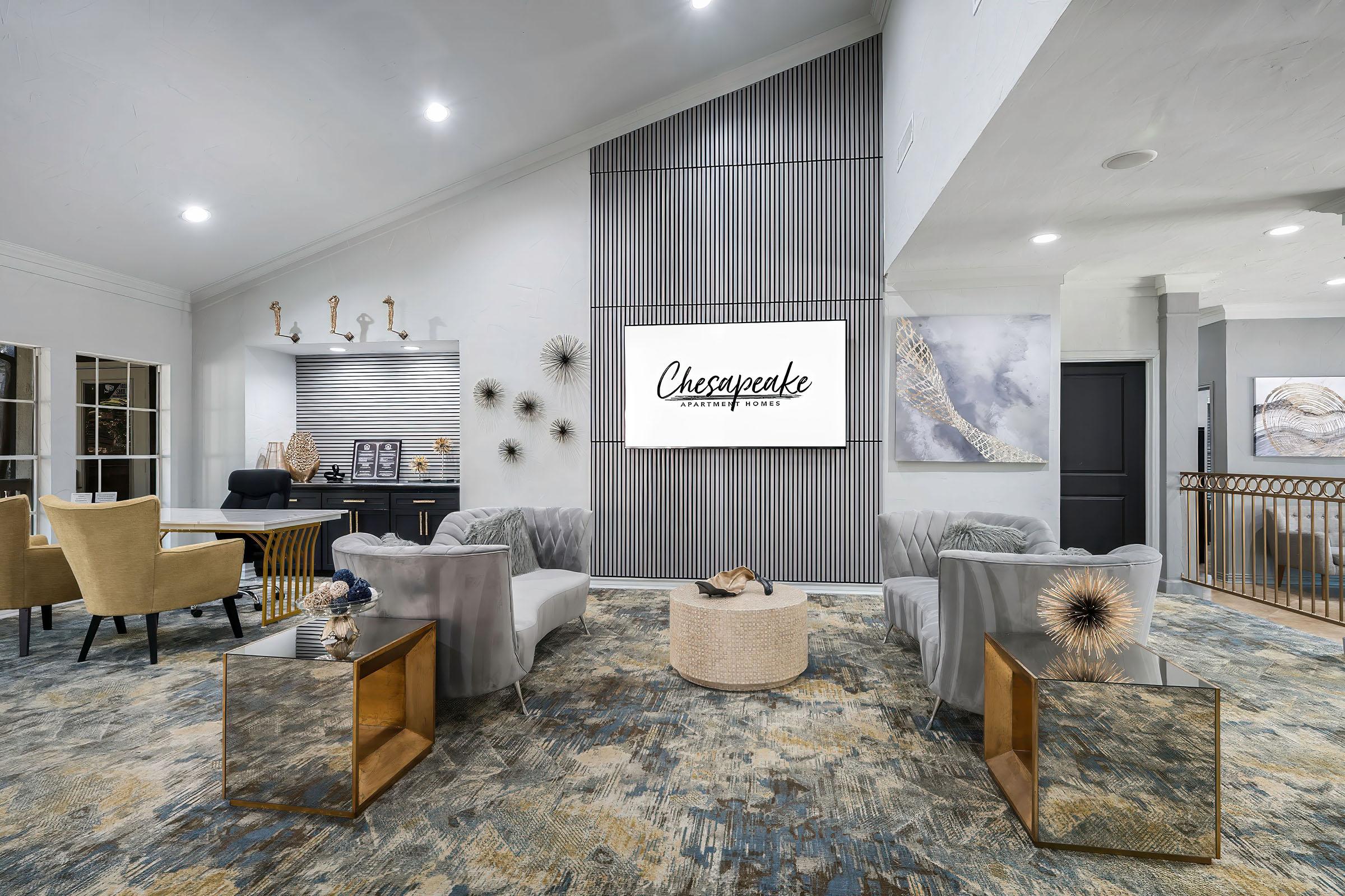 a living room filled with furniture and a fireplace