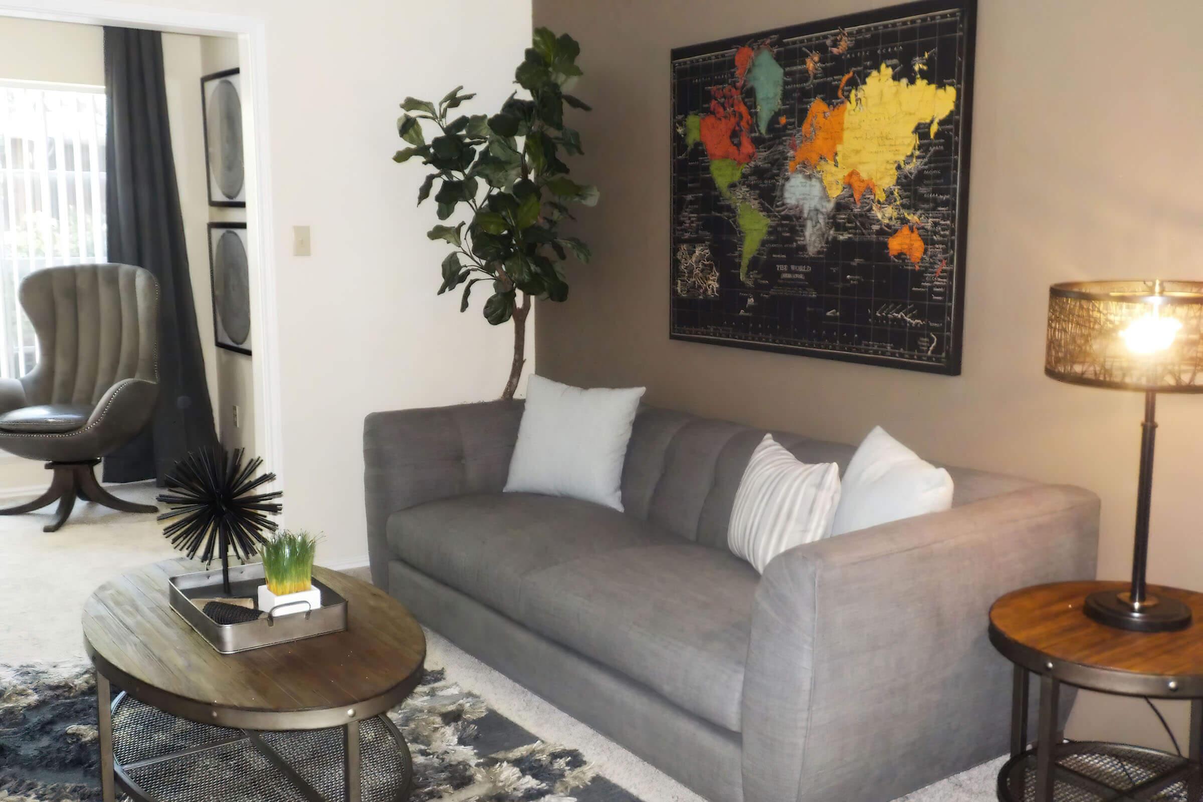 a living room with a leather chair