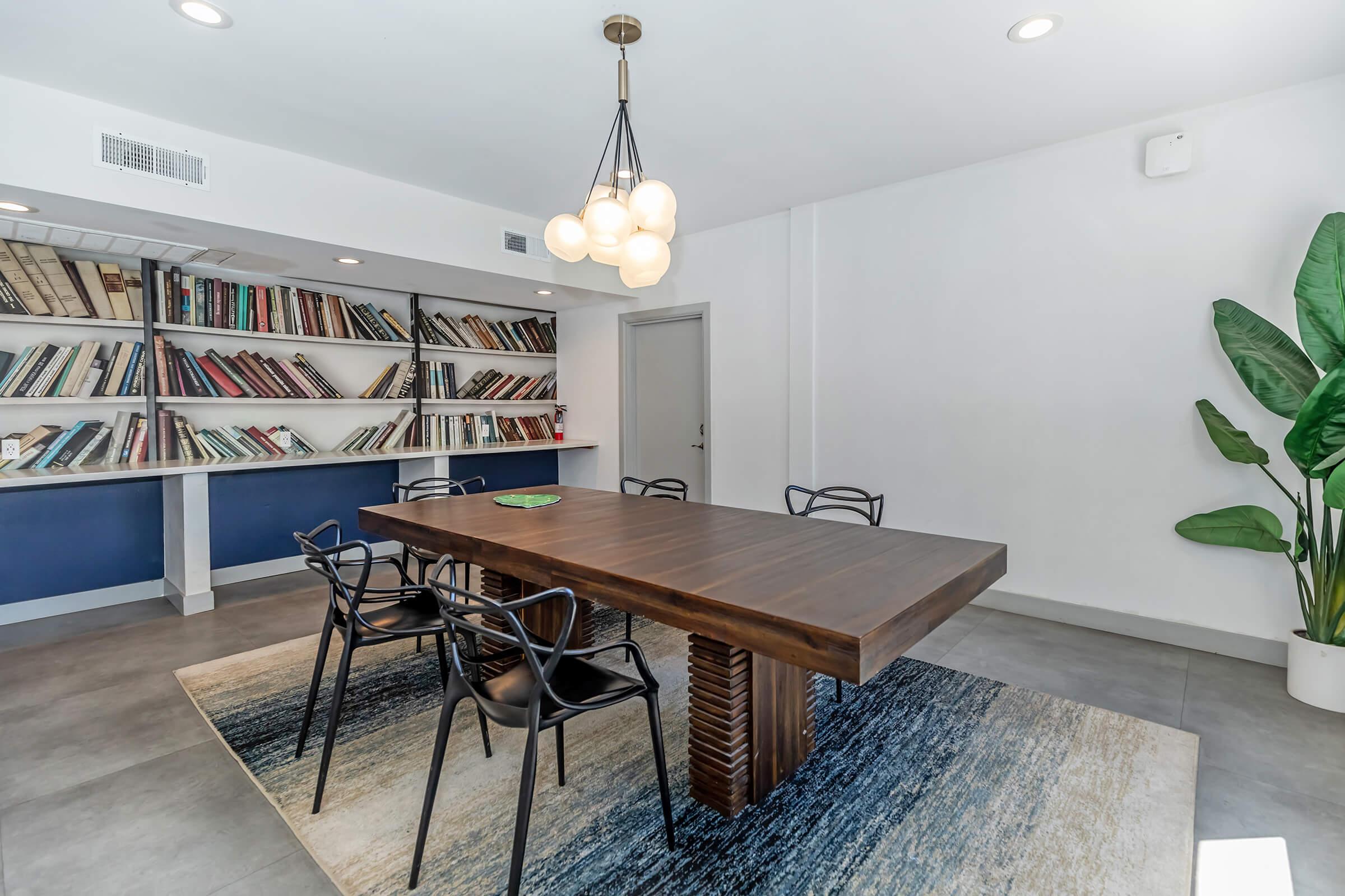 a room filled with furniture and a table