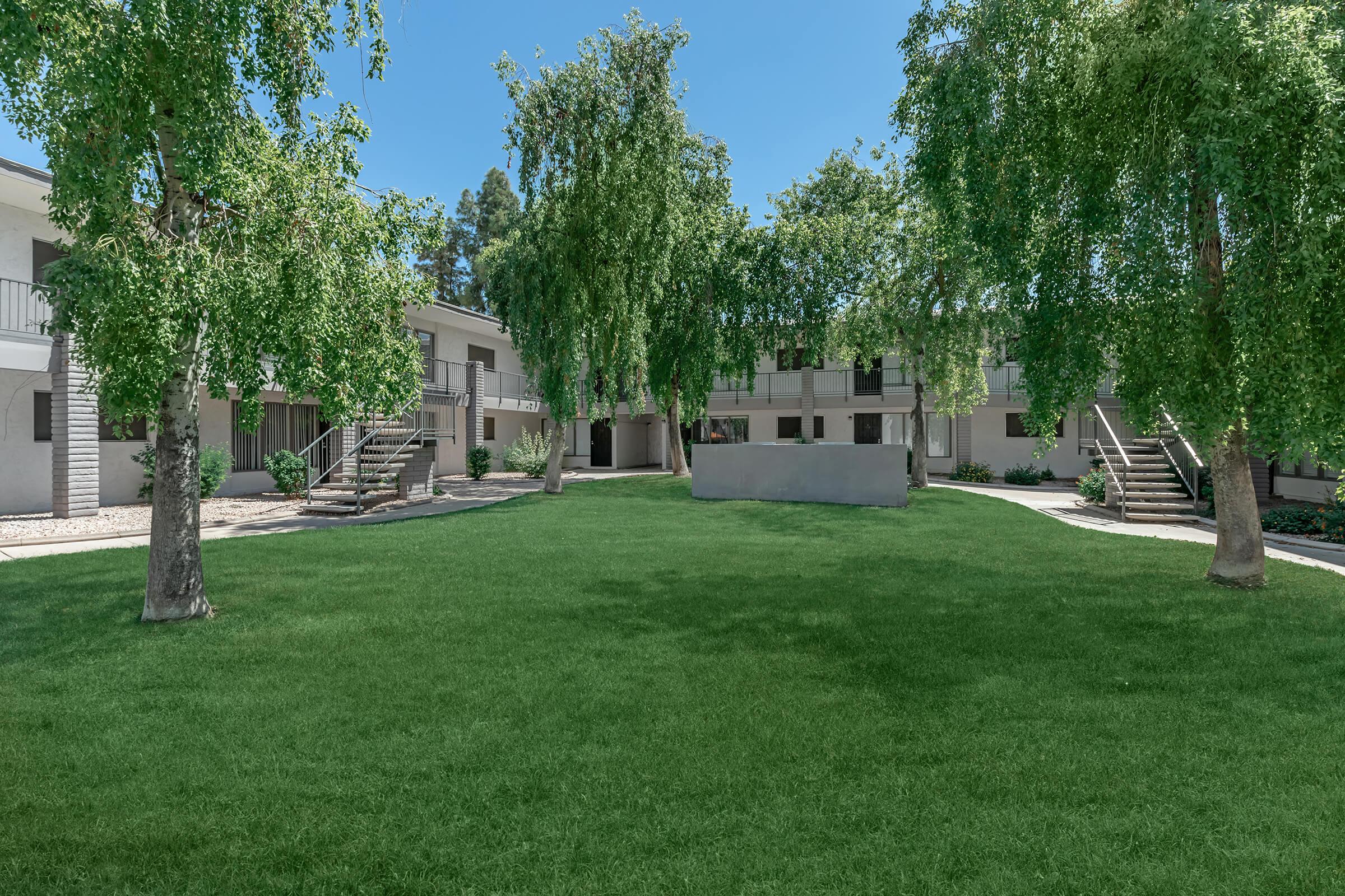 a large lawn in front of a house