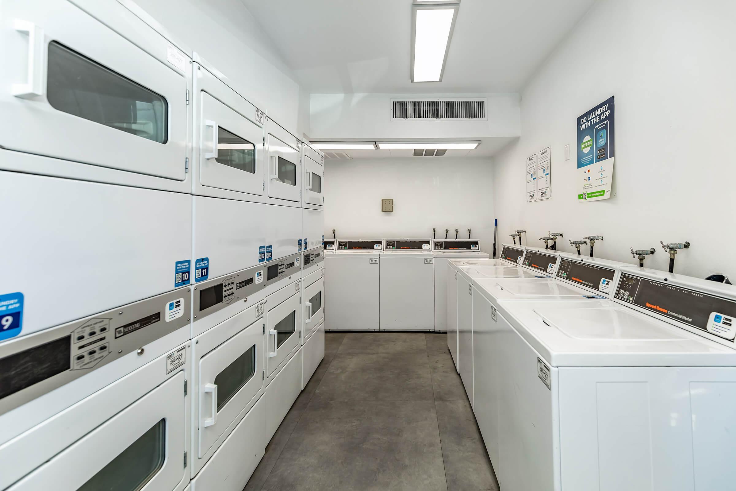 a stove top oven sitting inside of a kitchen